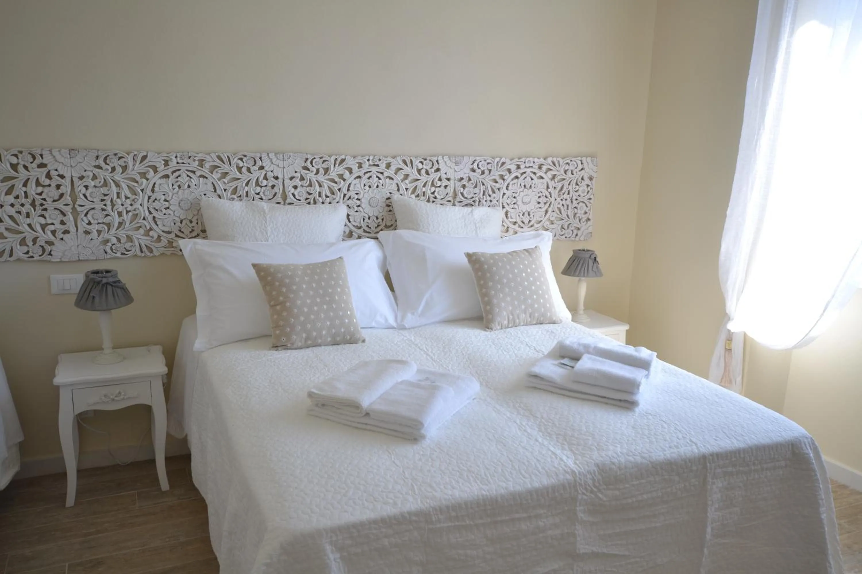 Decorative detail, Bed in Affittacamere Casa Dane'