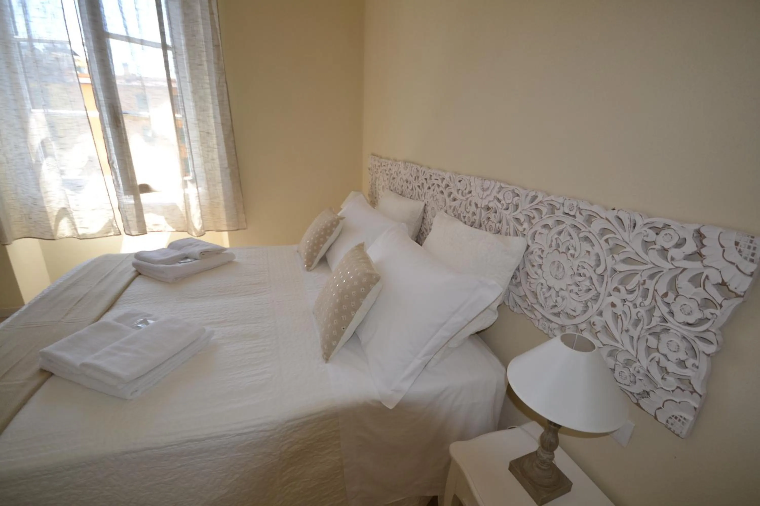 Decorative detail, Bed in Affittacamere Casa Dane'