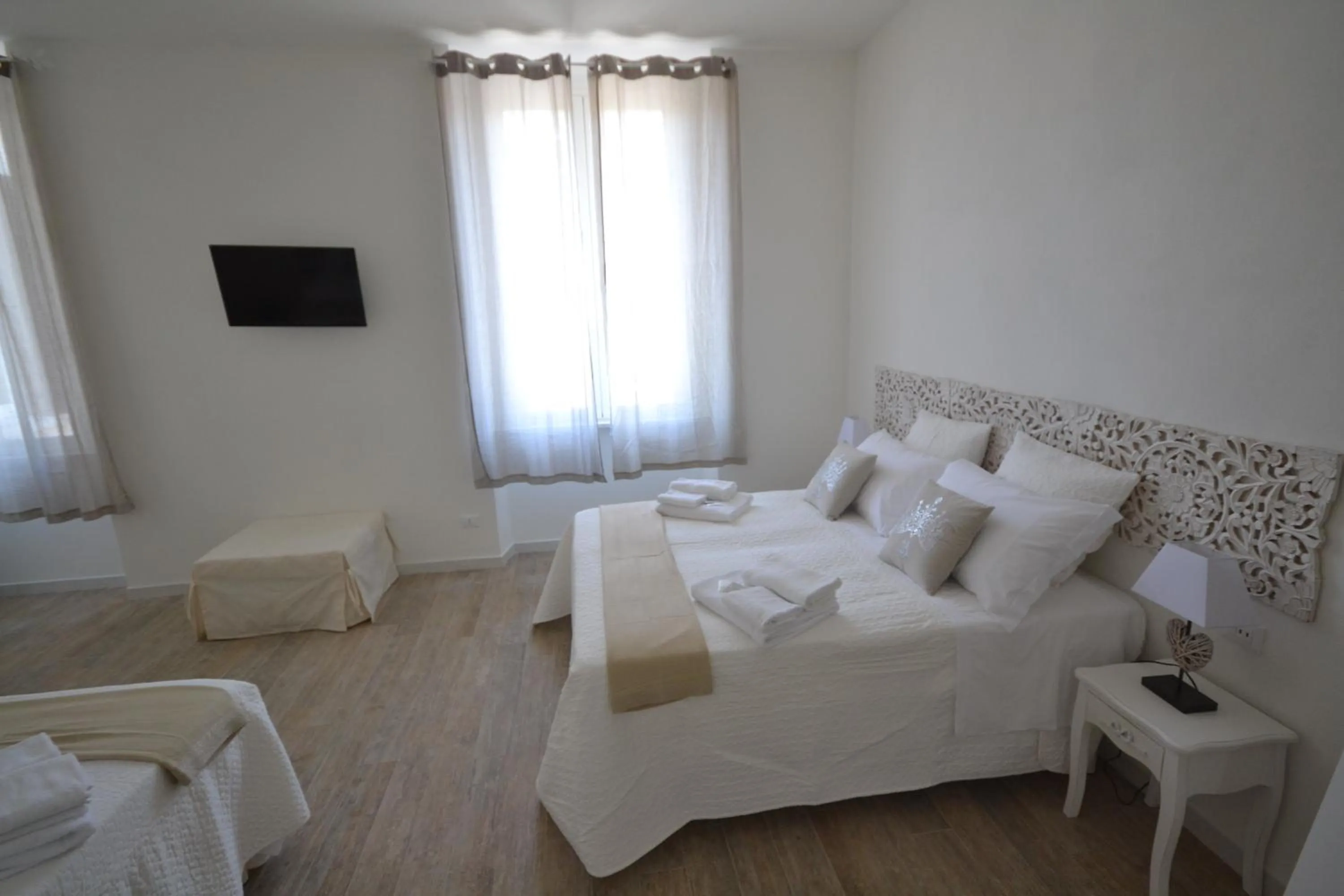 Decorative detail, Bed in Affittacamere Casa Dane'