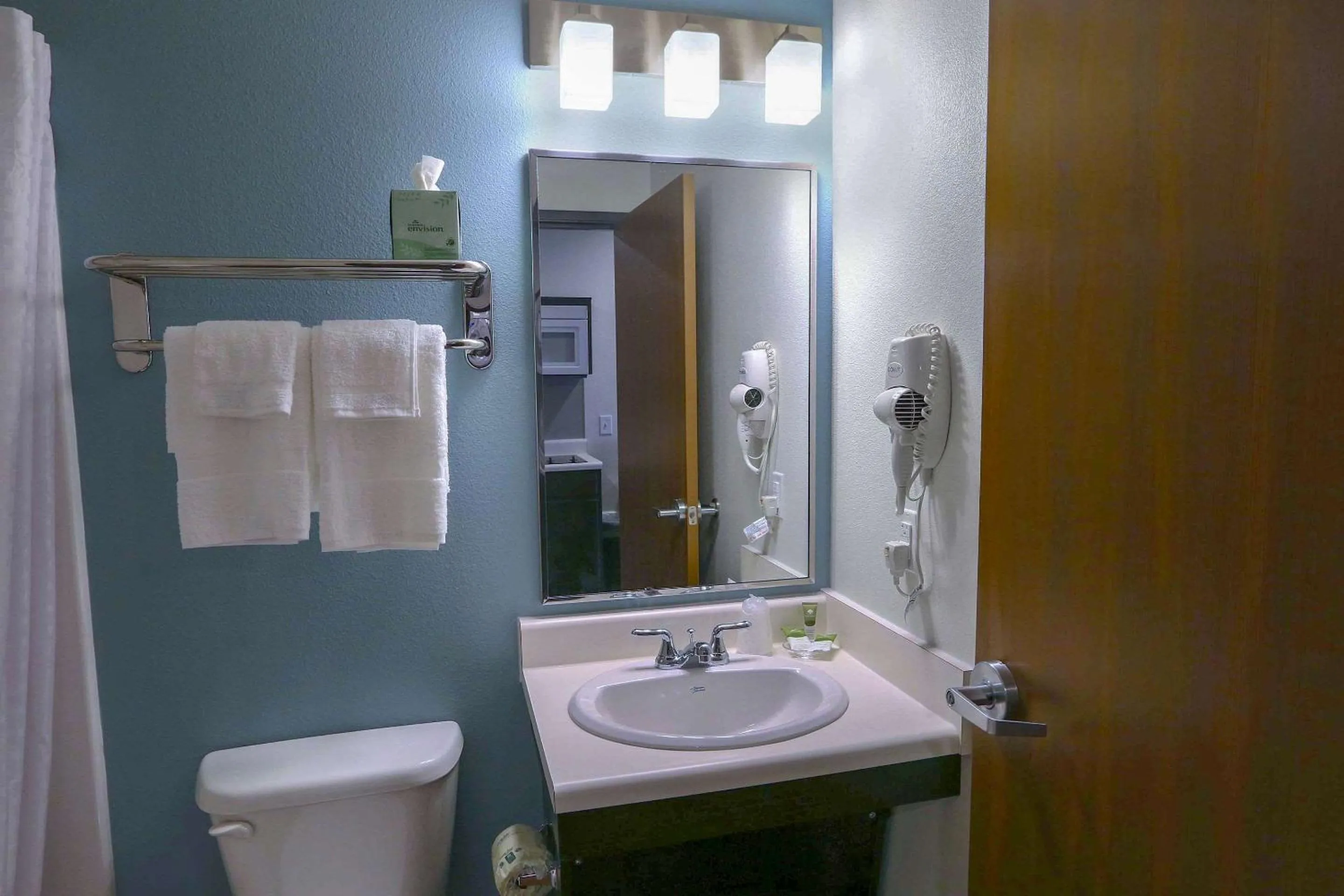 Bathroom in WoodSpring Suites Las Colinas - Northwest Dallas