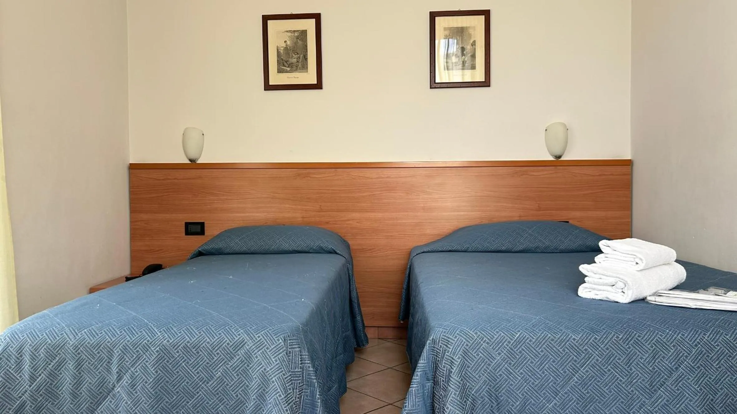 Bed in Albergo Salerno