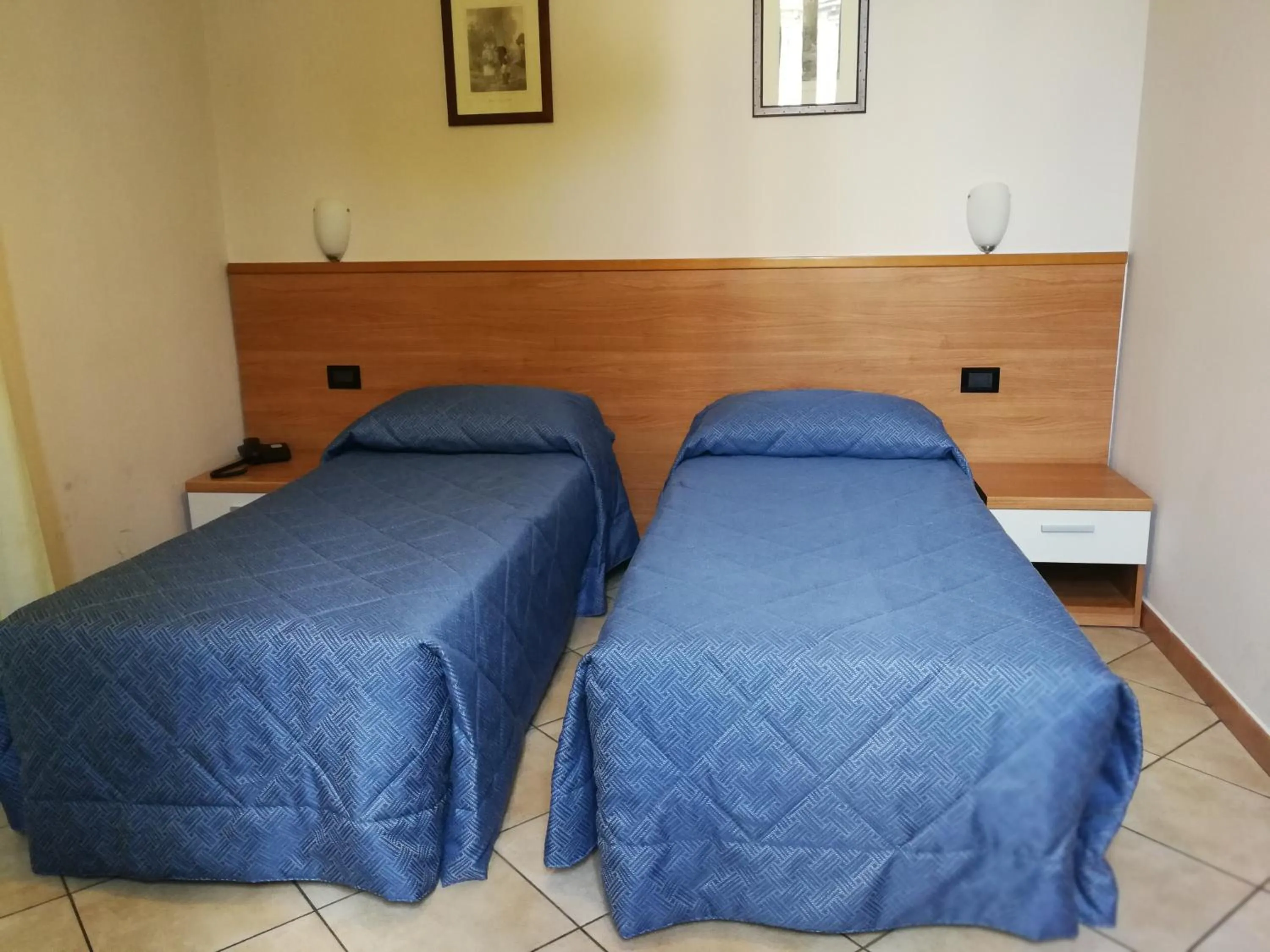 Bed in Albergo Salerno