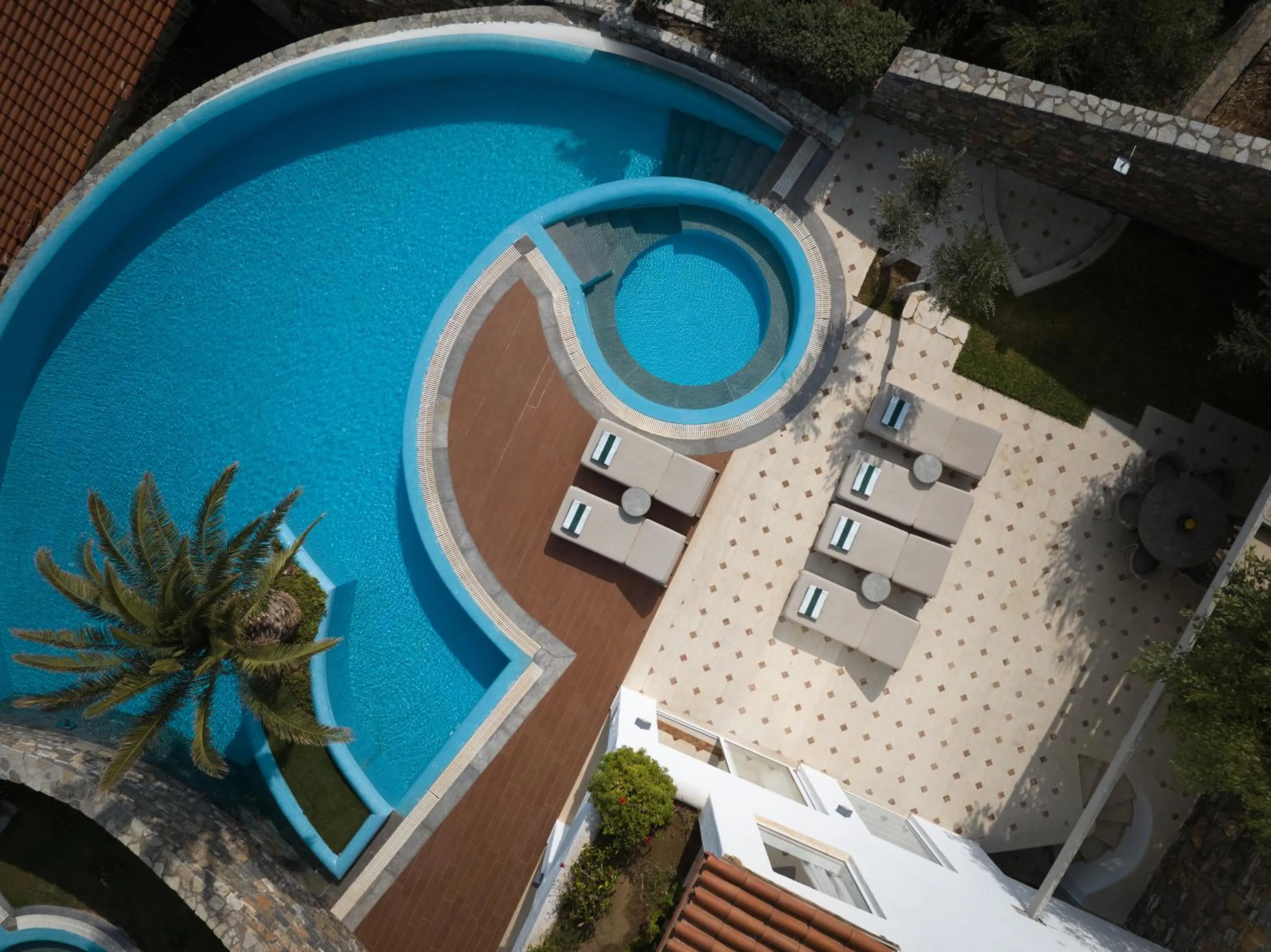 Swimming pool in Elounda Gulf Villas by Sandglass
