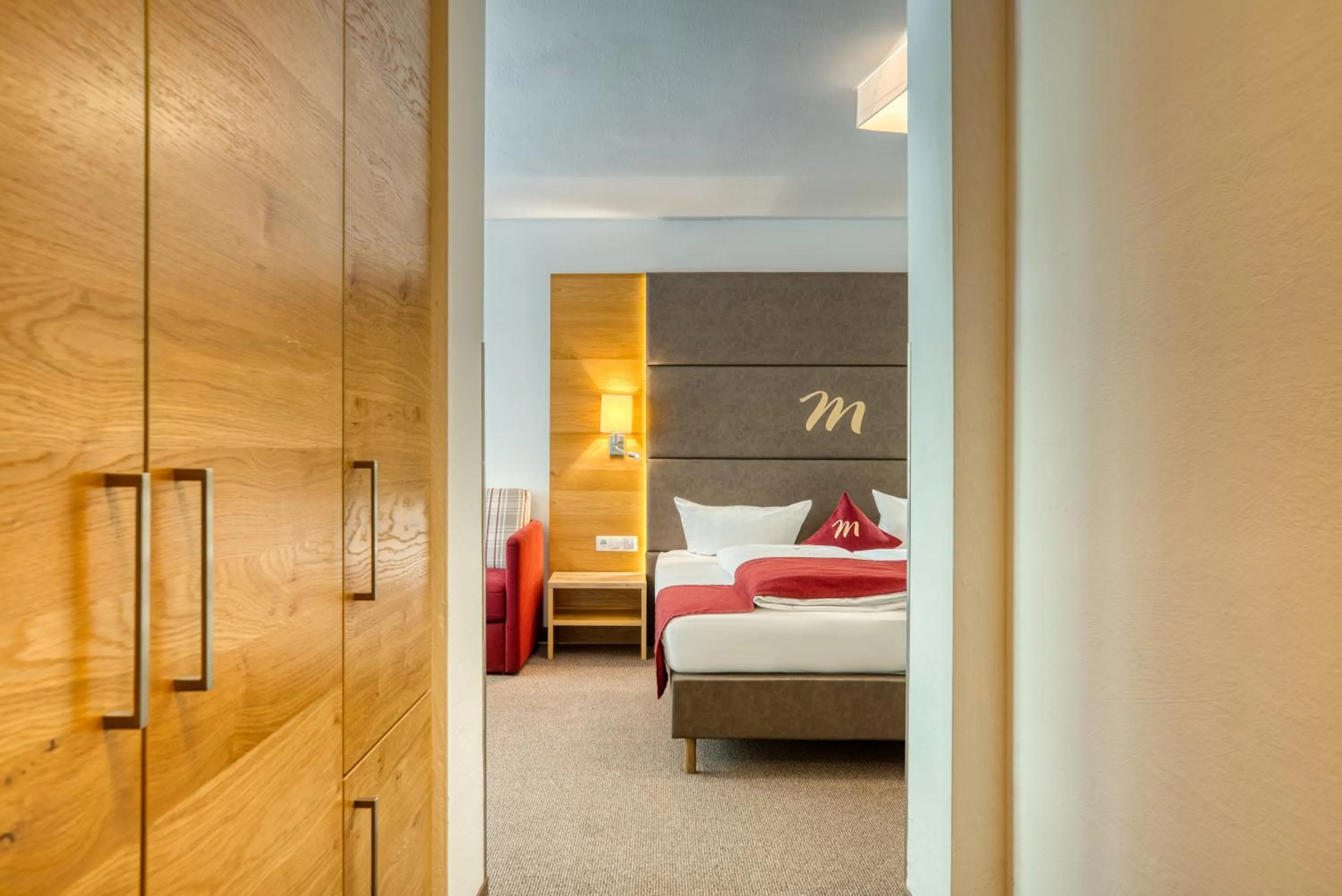 Photo of the whole room, Bed in Mallaun Hotel.Erlebnis