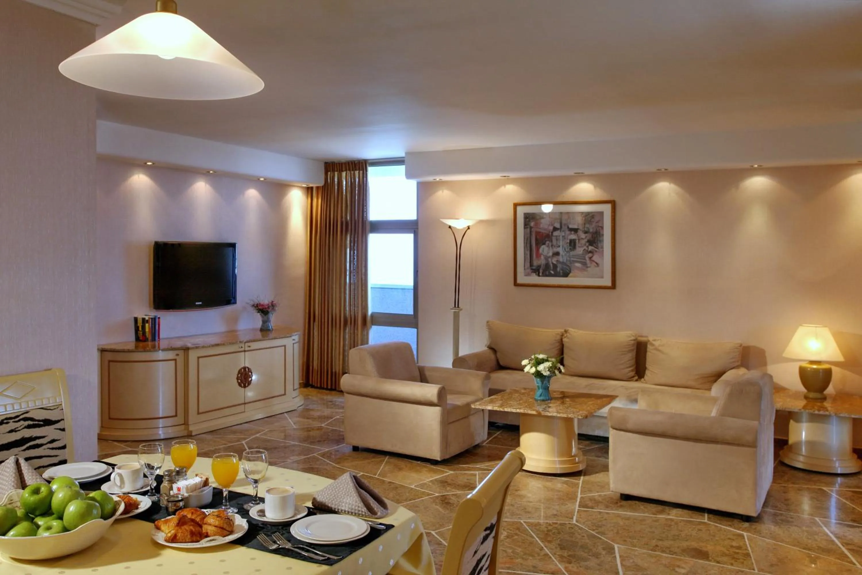 Living room in The Seasons Hotel -Studio & Suite