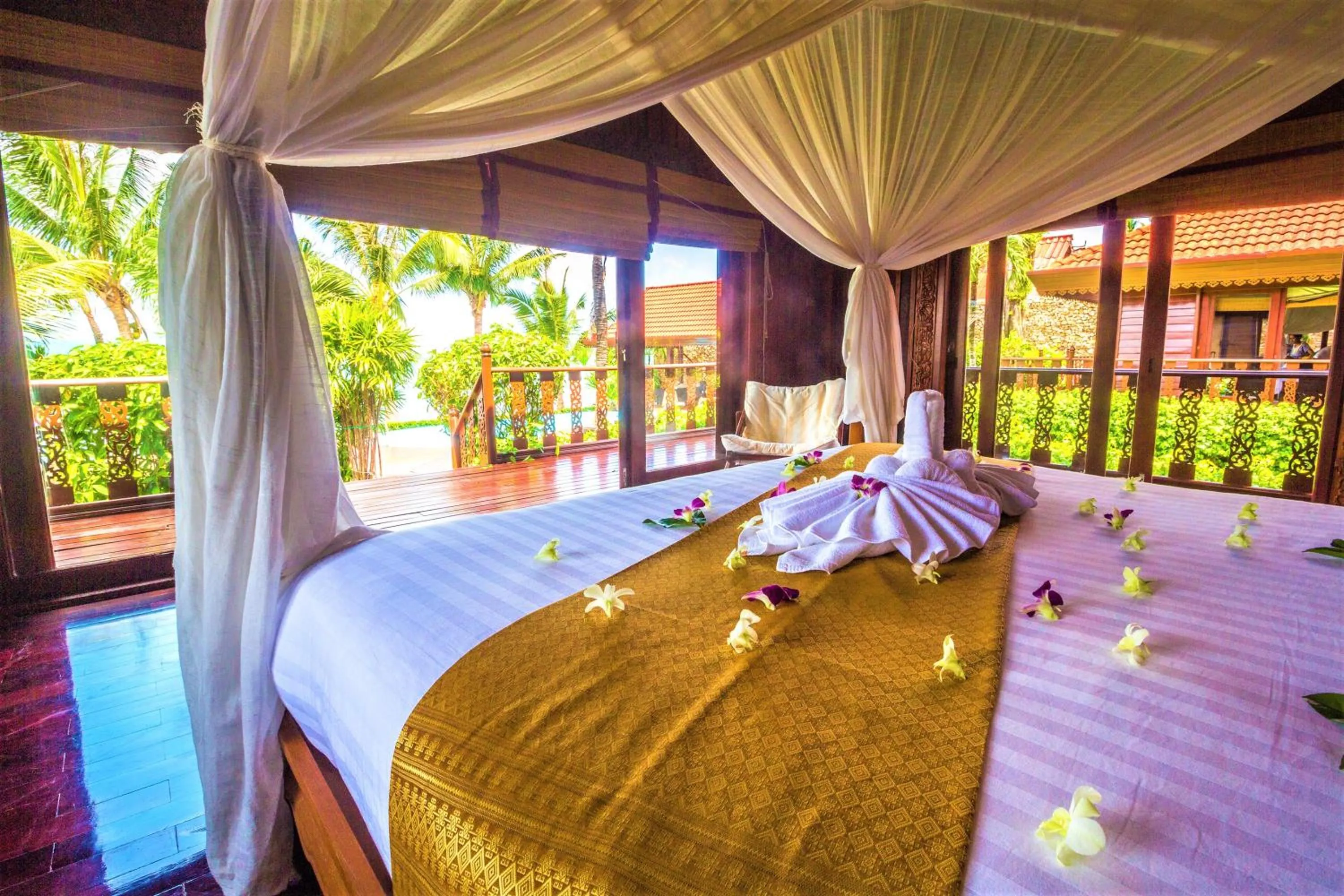 Bed in Erawan Villa Hotel