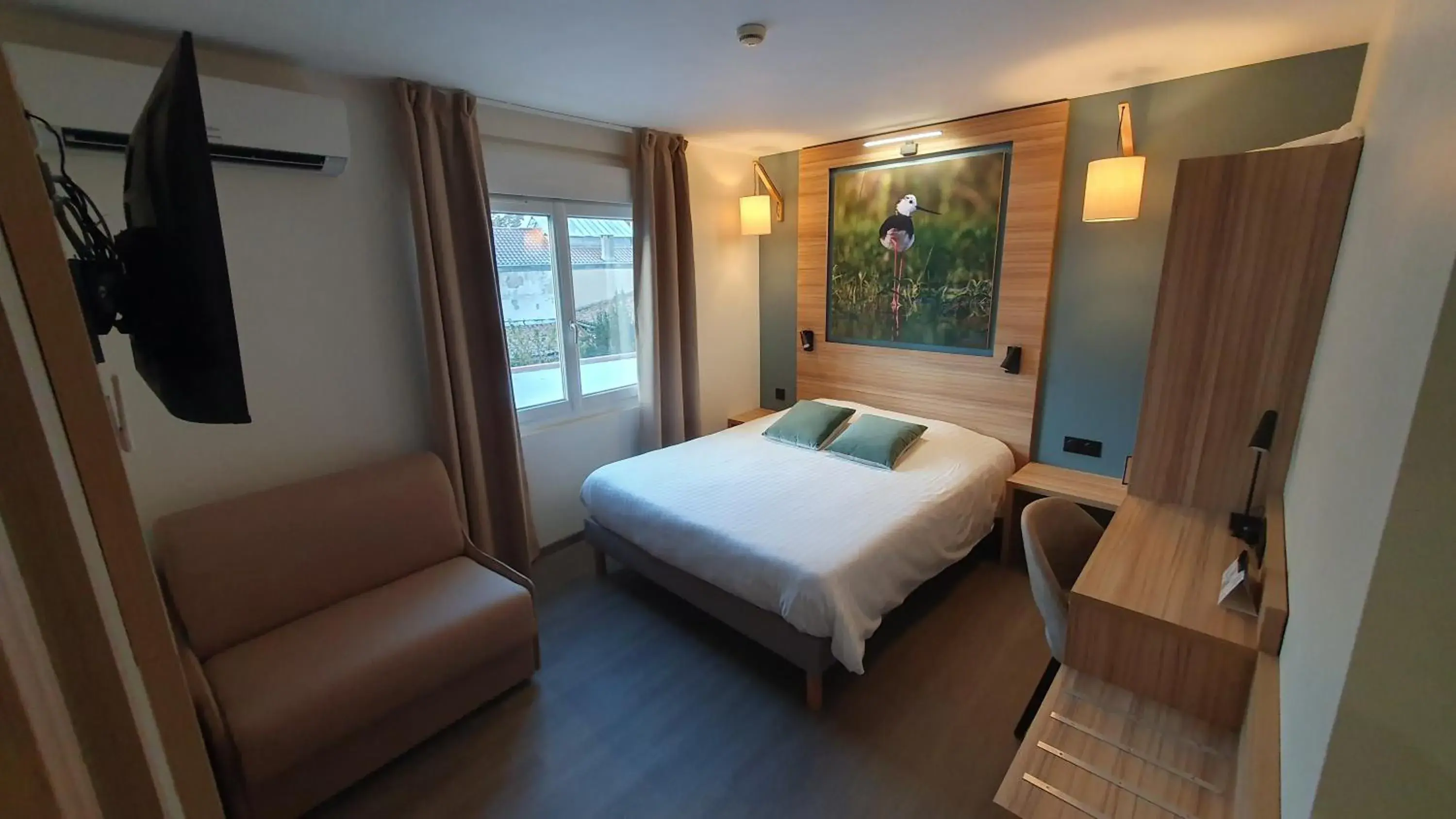 Family Room in Logis Hôtel - Les Pasteliers Family Room in Logis Hôtel - Les Pasteliers