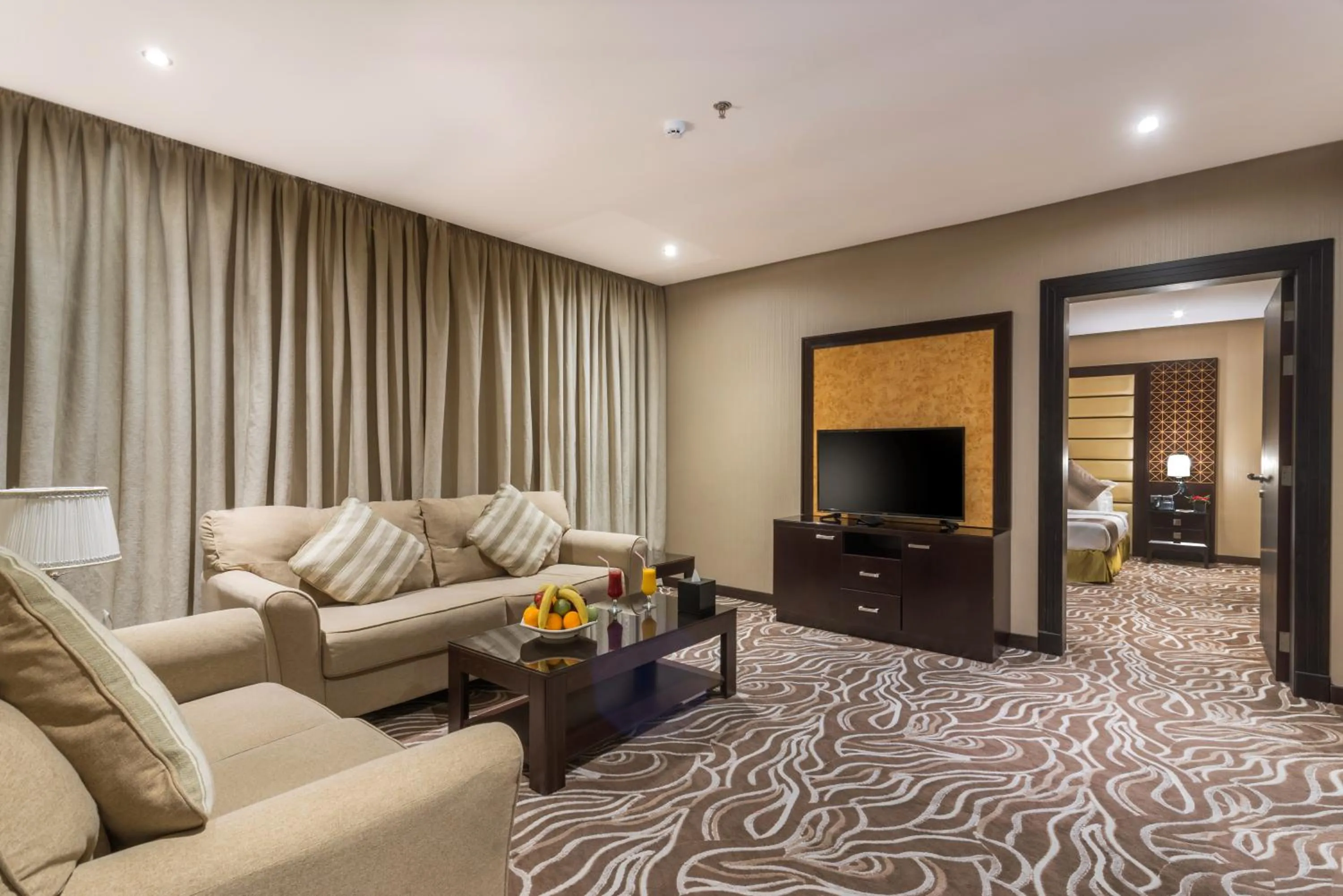 Communal lounge/ TV room in Naviti Warwick Al Khobar