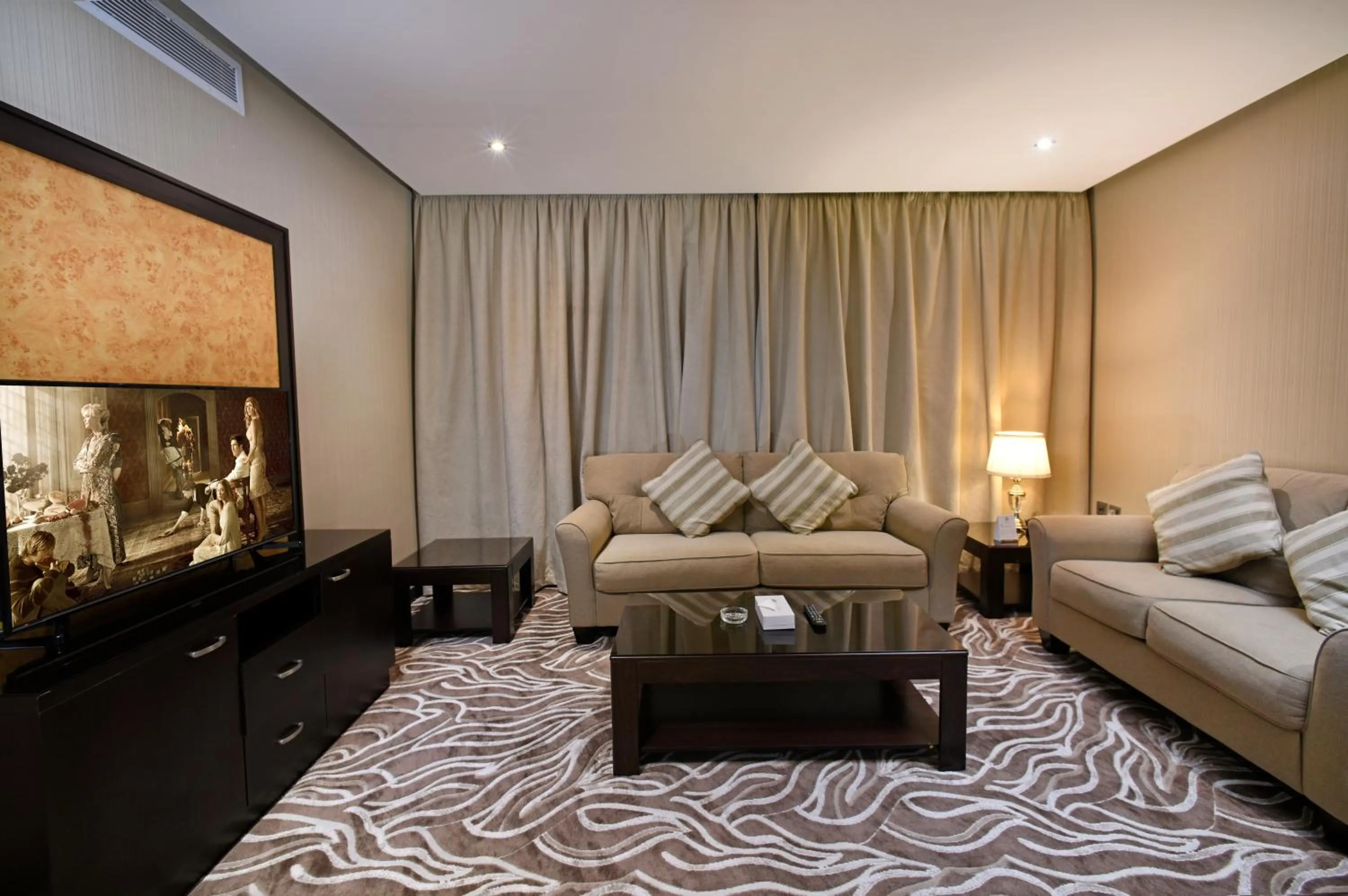 Communal lounge/ TV room in Naviti Warwick Al Khobar