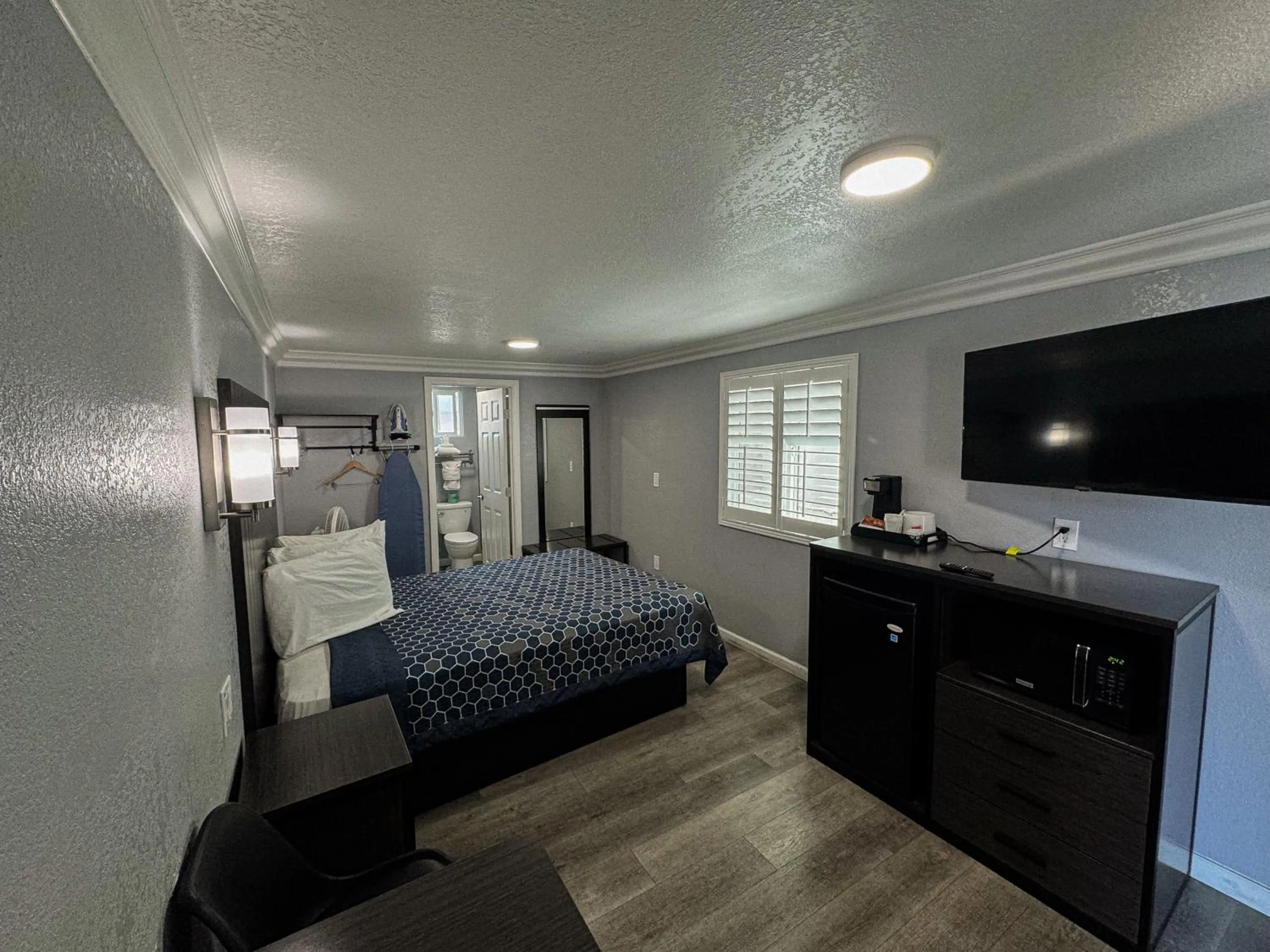 Bed in Sea Garden Inn