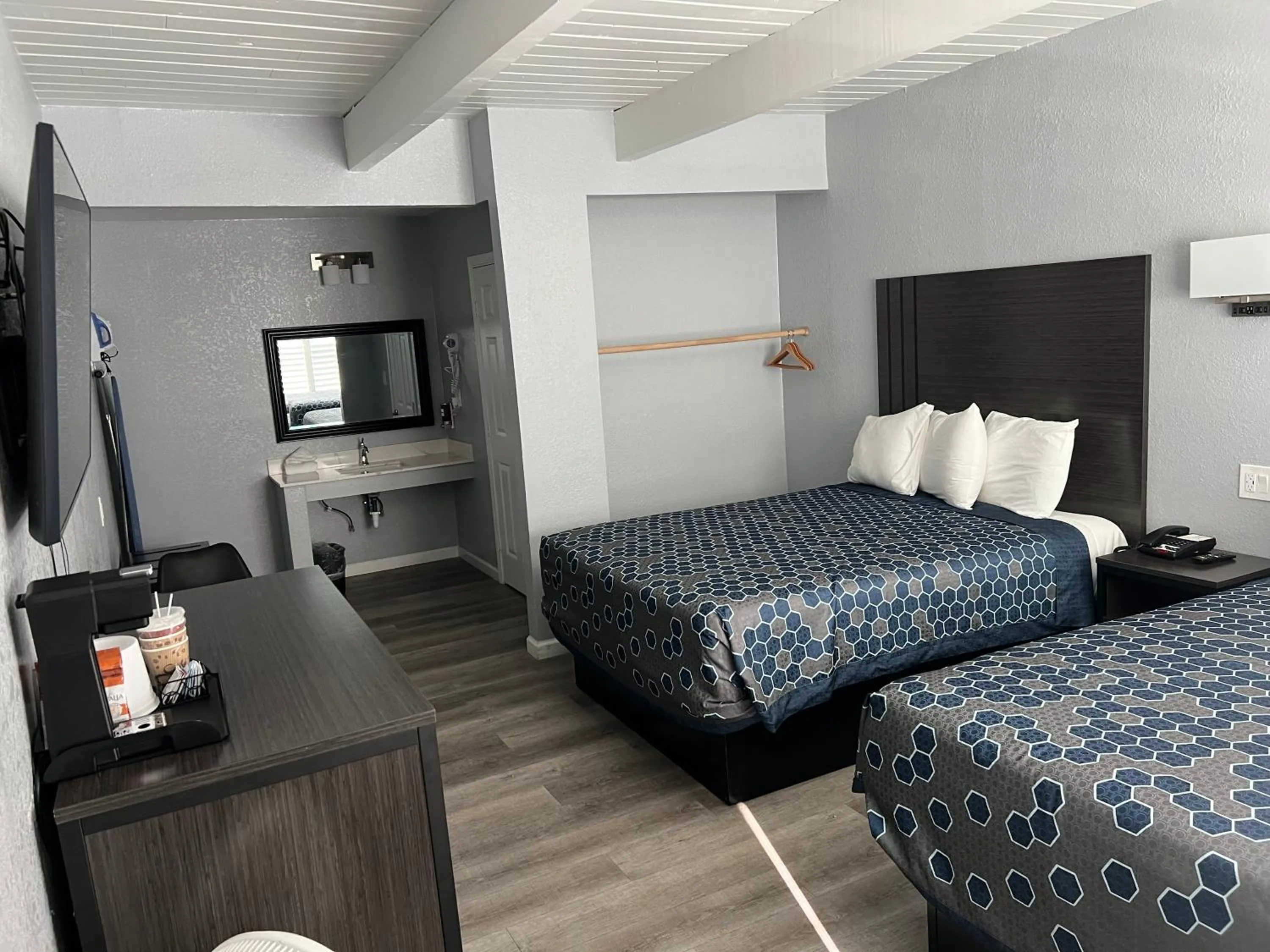 Bed in Sea Garden Inn