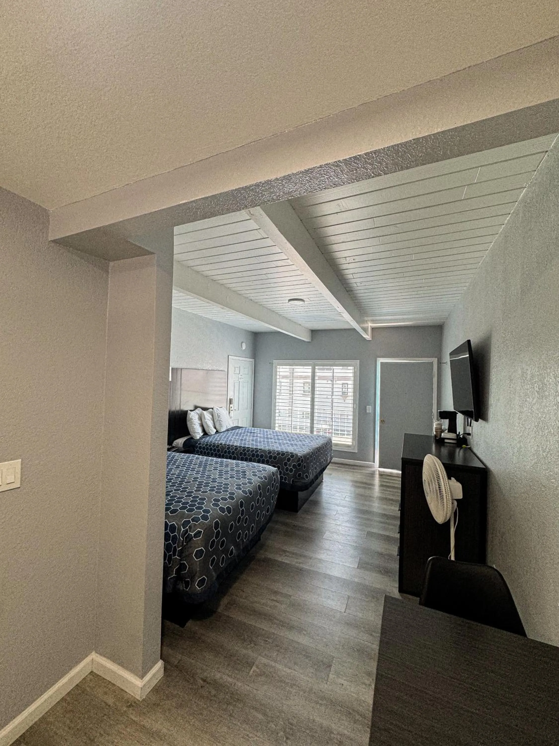 Bed in Sea Garden Inn