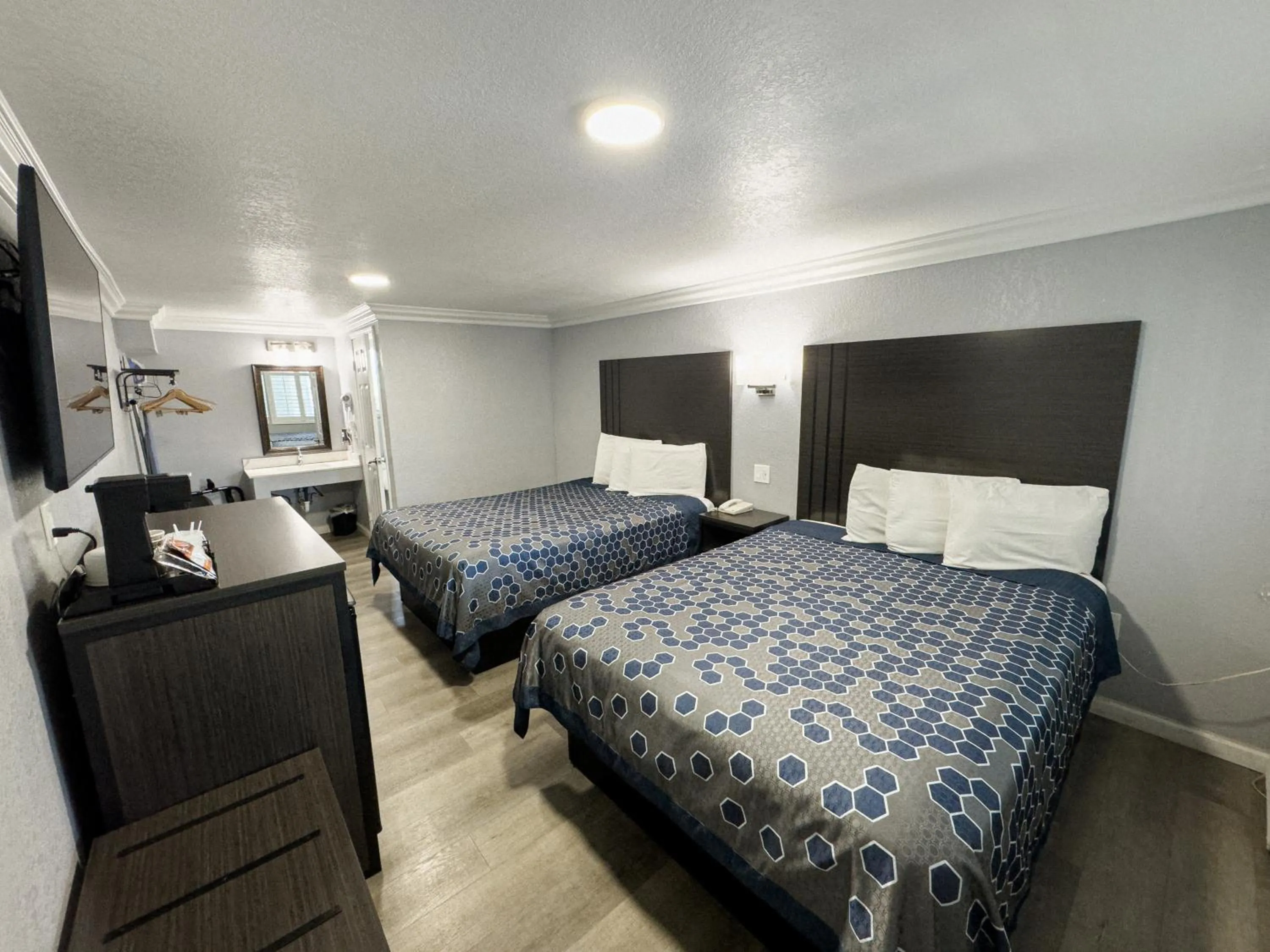 Bed in Sea Garden Inn