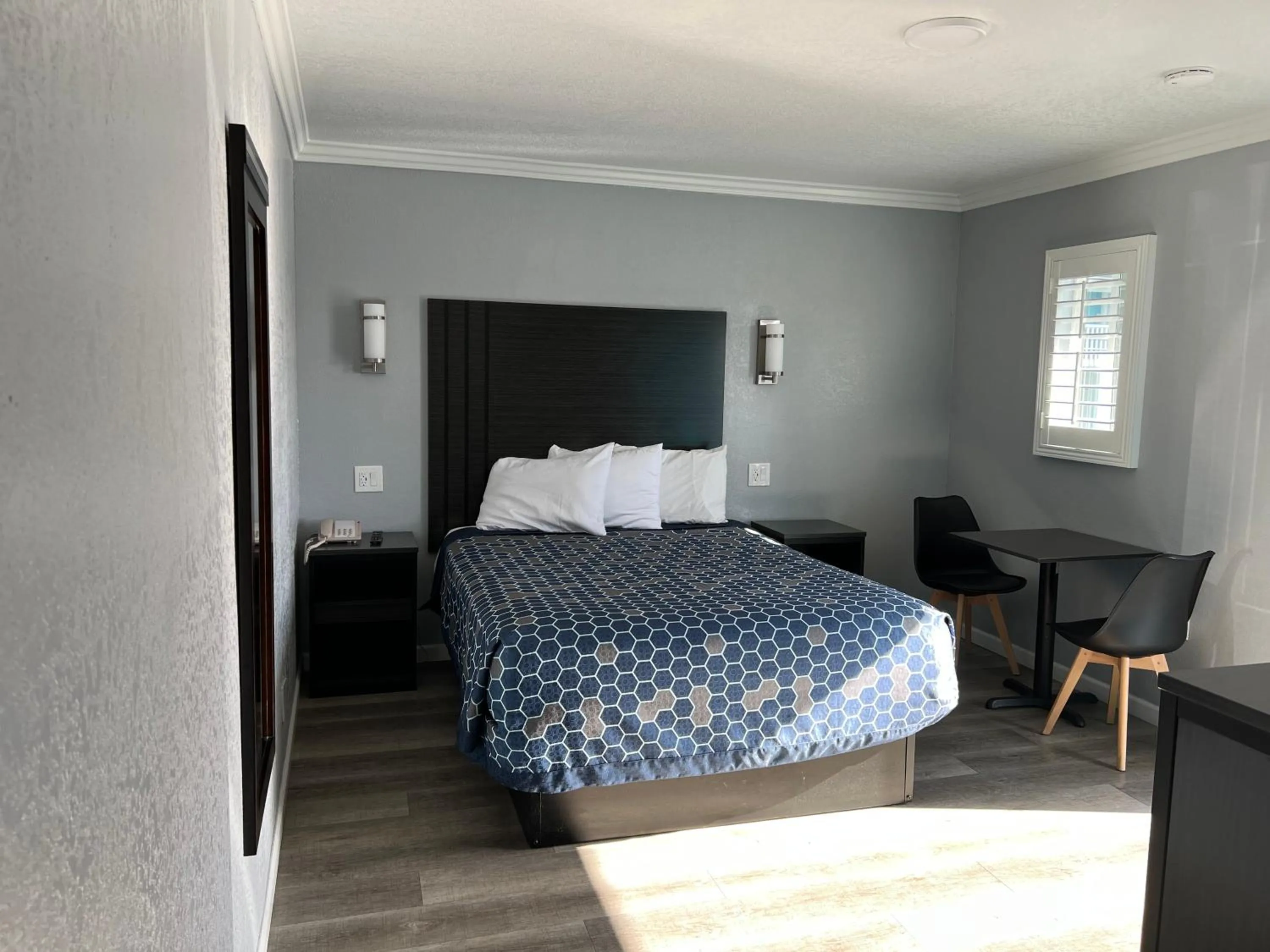 Bed in Sea Garden Inn