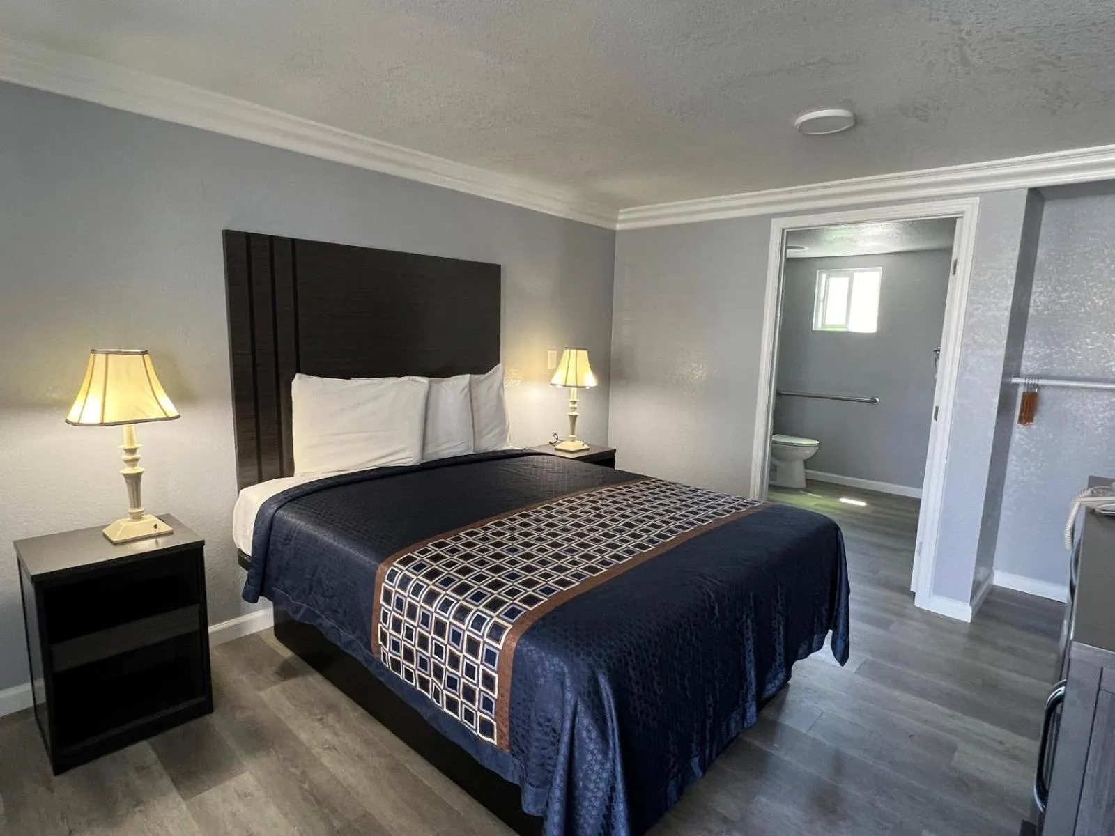 Bed in Sea Garden Inn