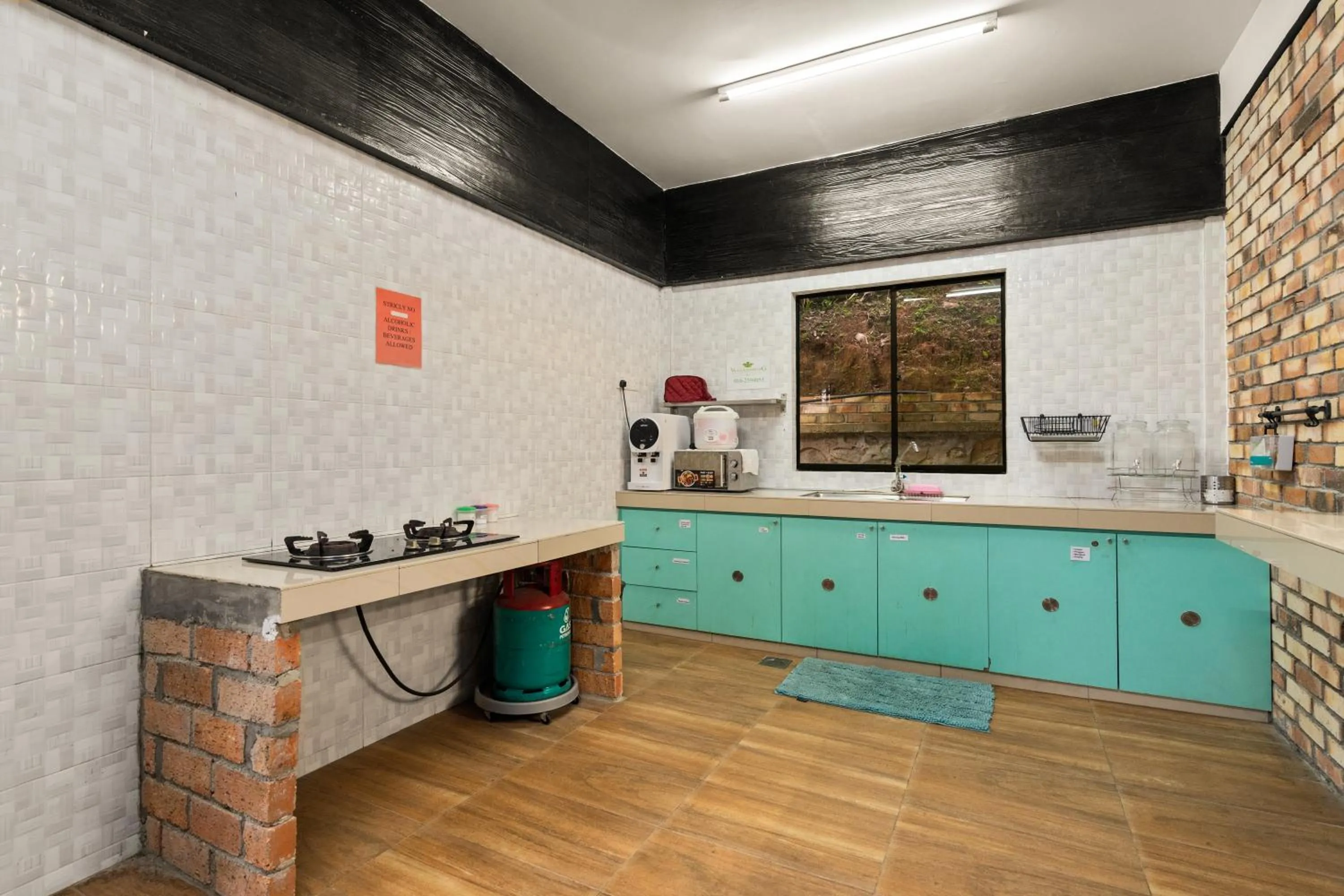 Kitchen or kitchenette in Villa Kiambang