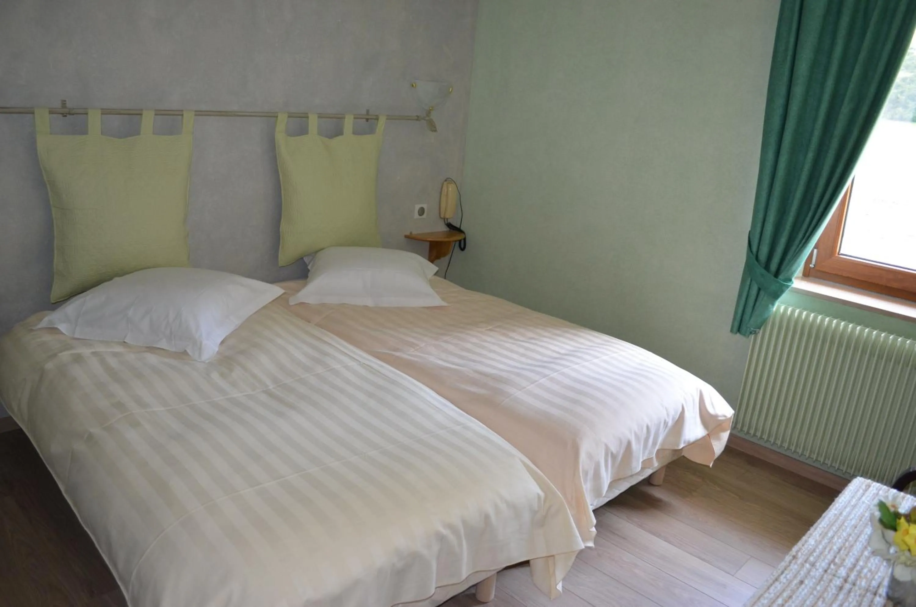Bed in Logis Hotel & Restaurant - Les Vosges