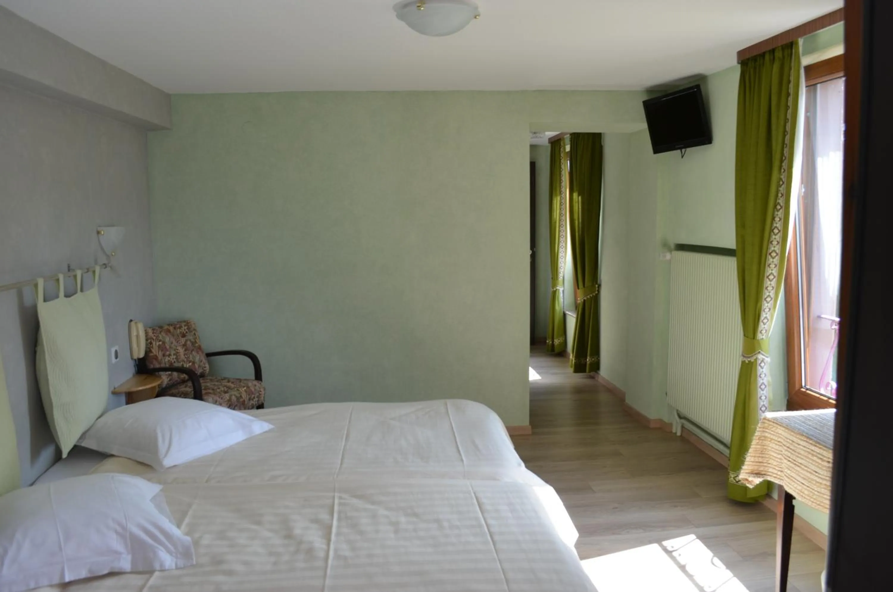 Bed in Logis Hotel & Restaurant - Les Vosges