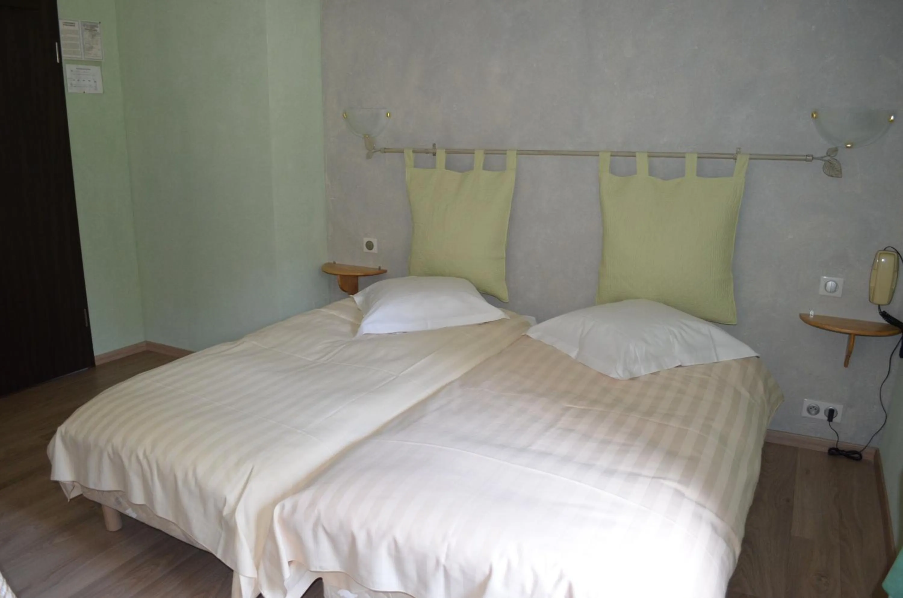 Bed in Logis Hotel & Restaurant - Les Vosges