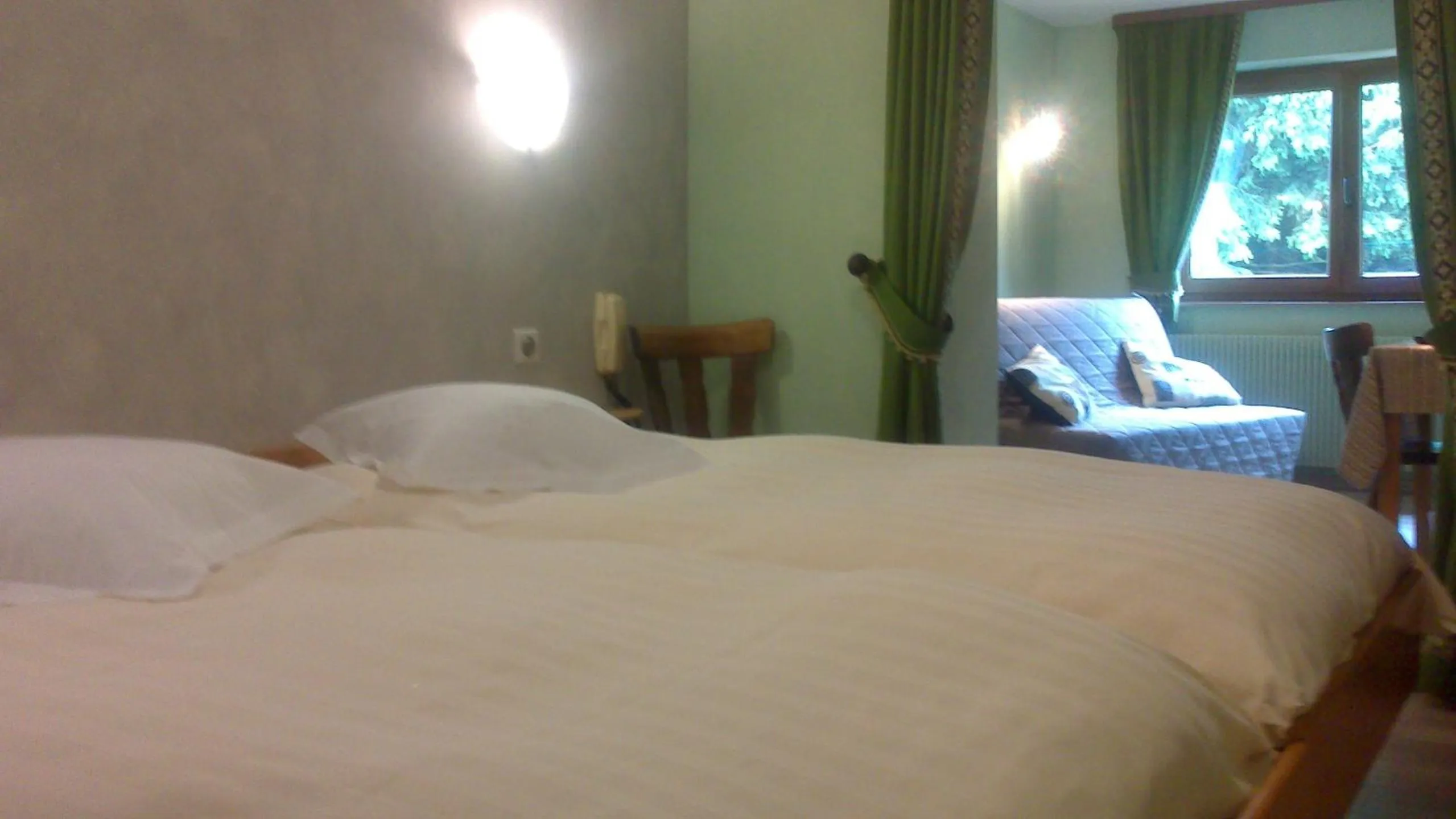 Bed in Logis Hotel & Restaurant - Les Vosges