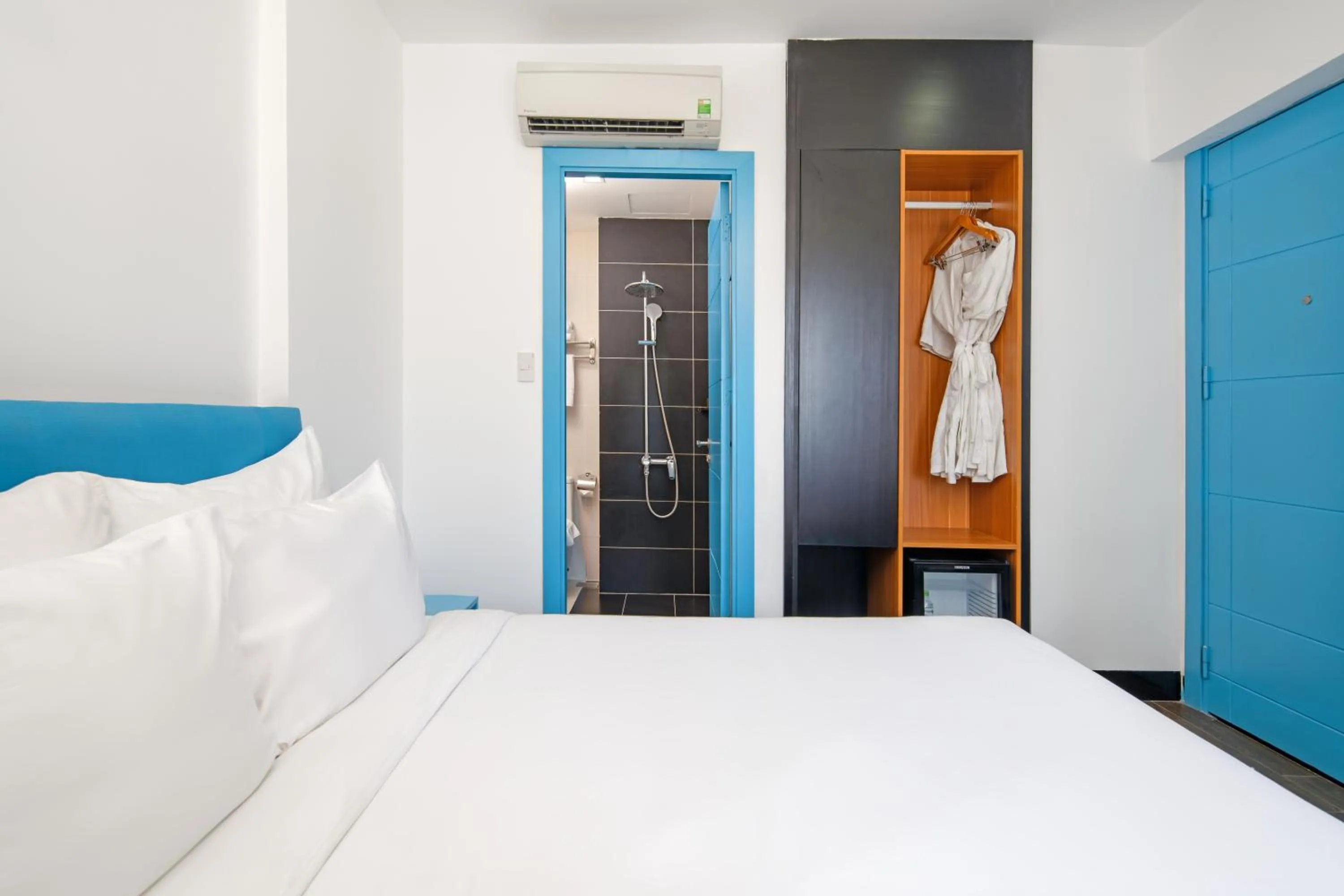 Bed in Platinum Danang Hotel