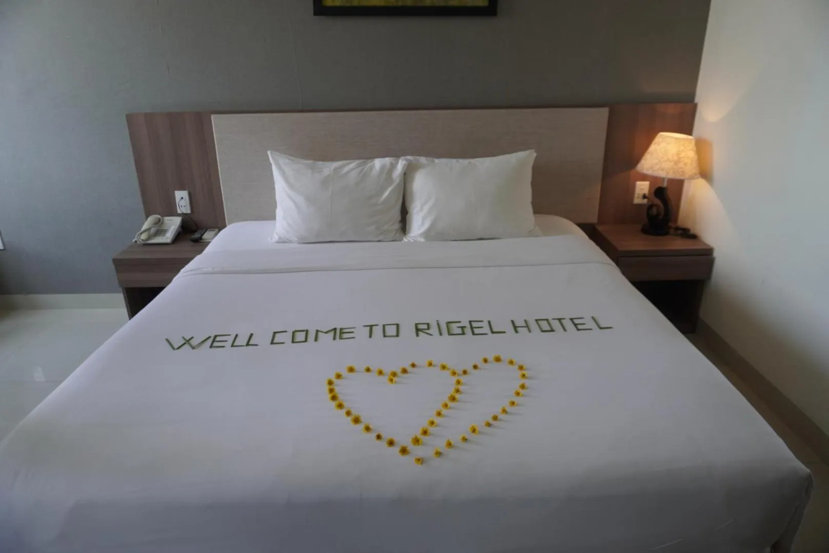 Bed in Rigel Hotel