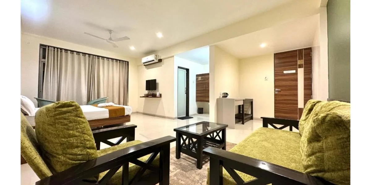 Bed in Hotel Sadhana Executive