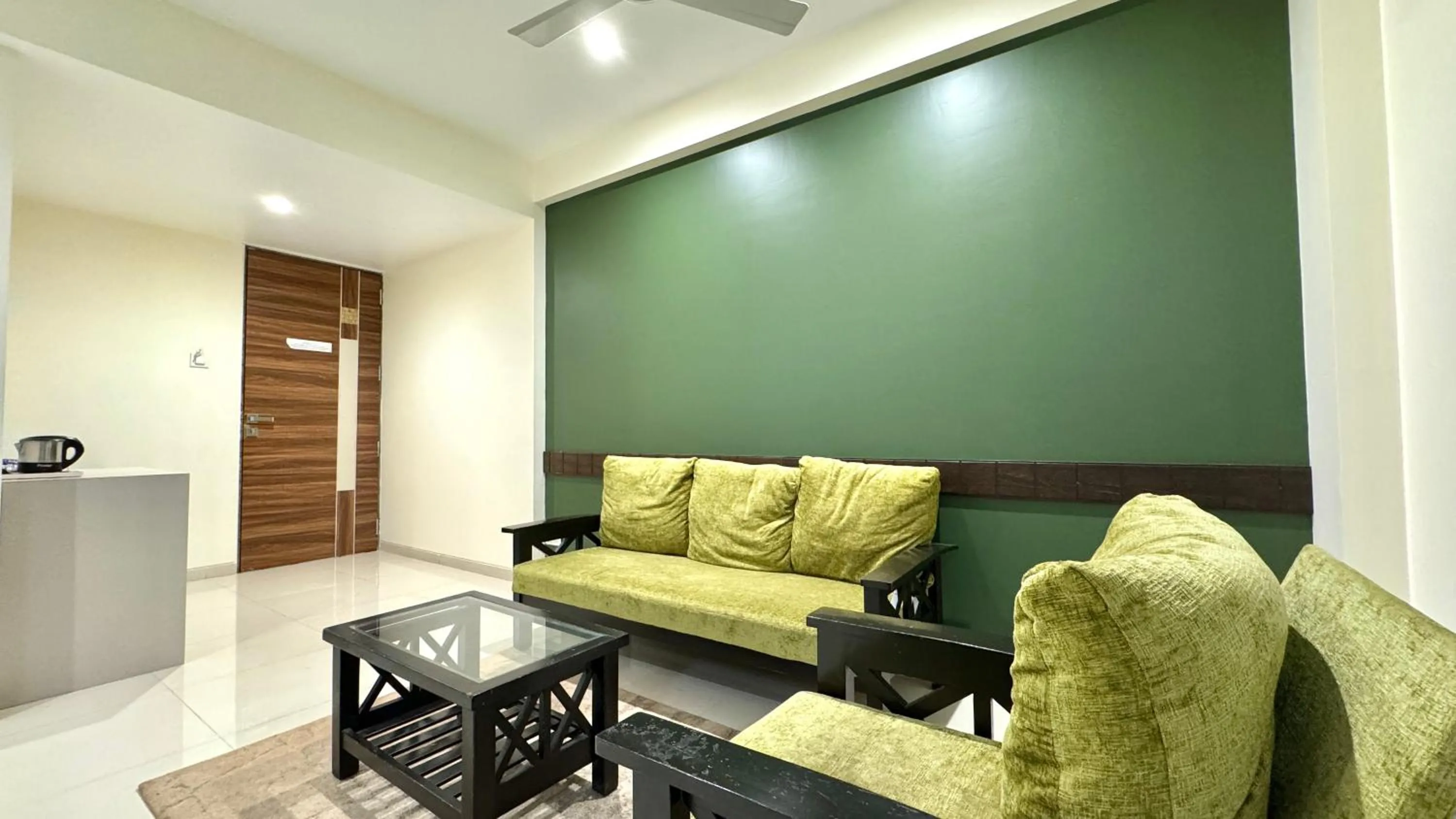 Seating area in Hotel Sadhana Executive