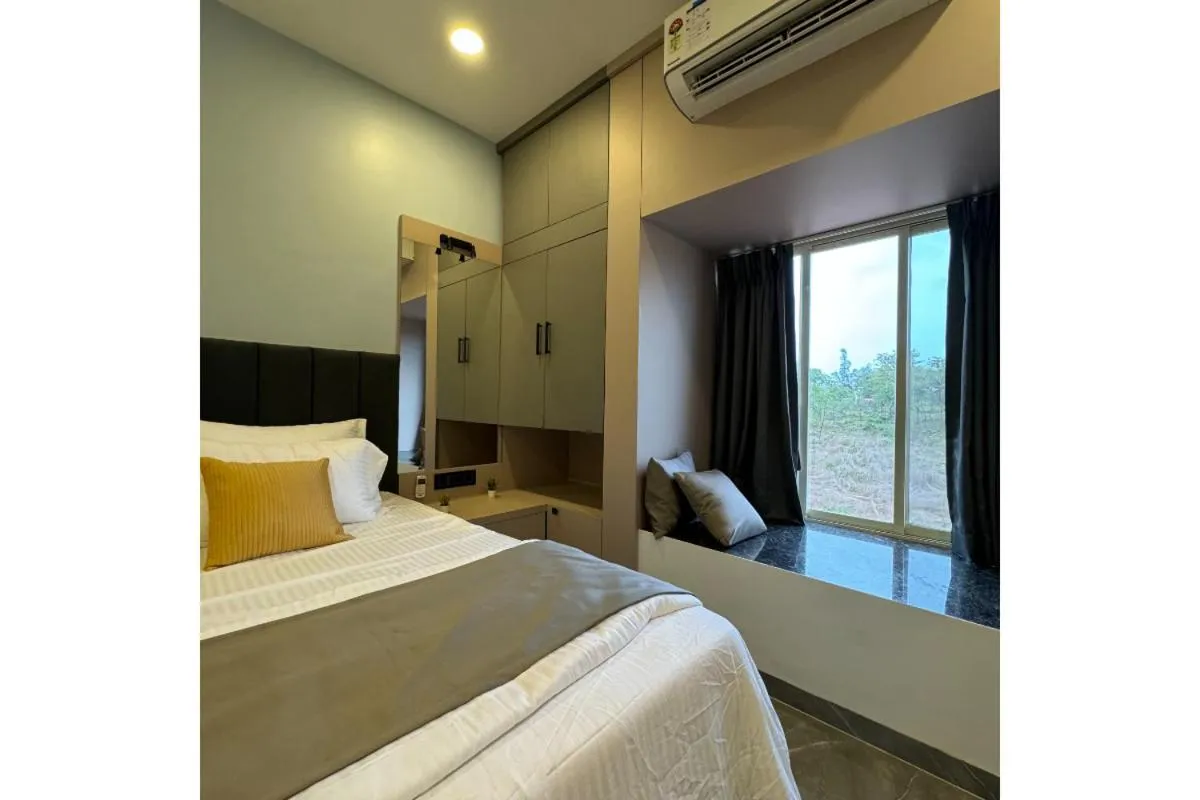 Bed in Hotel Sadhana Executive