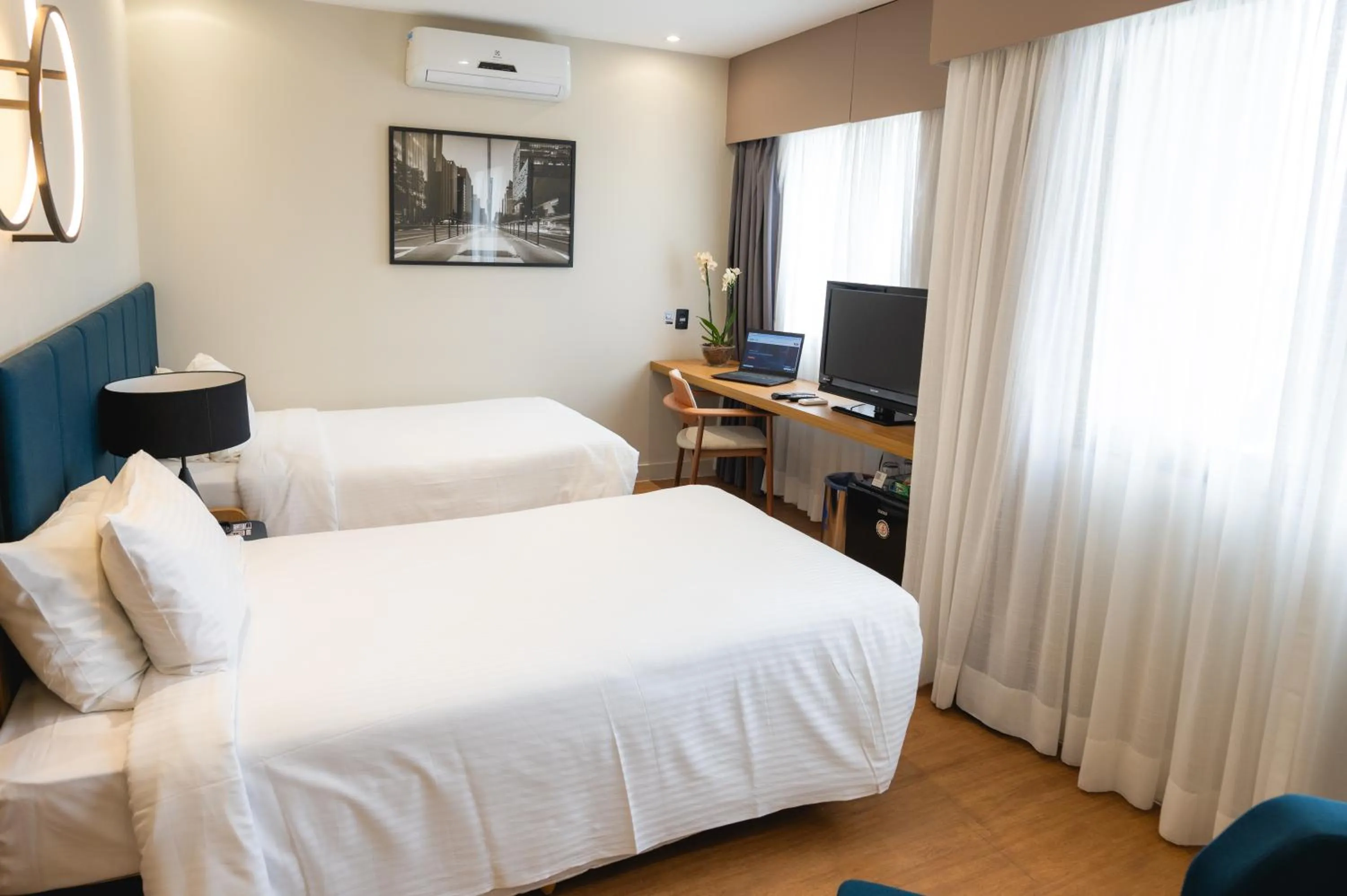 Bed in eSuítes Congonhas by Atlantica