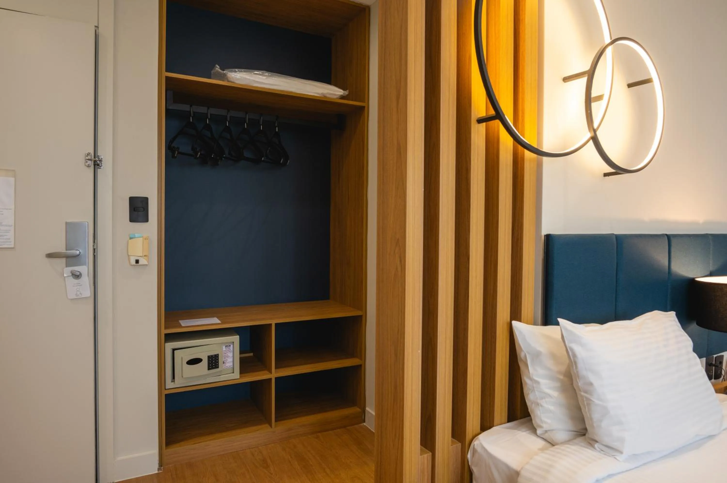 Bed in eSuítes Congonhas by Atlantica