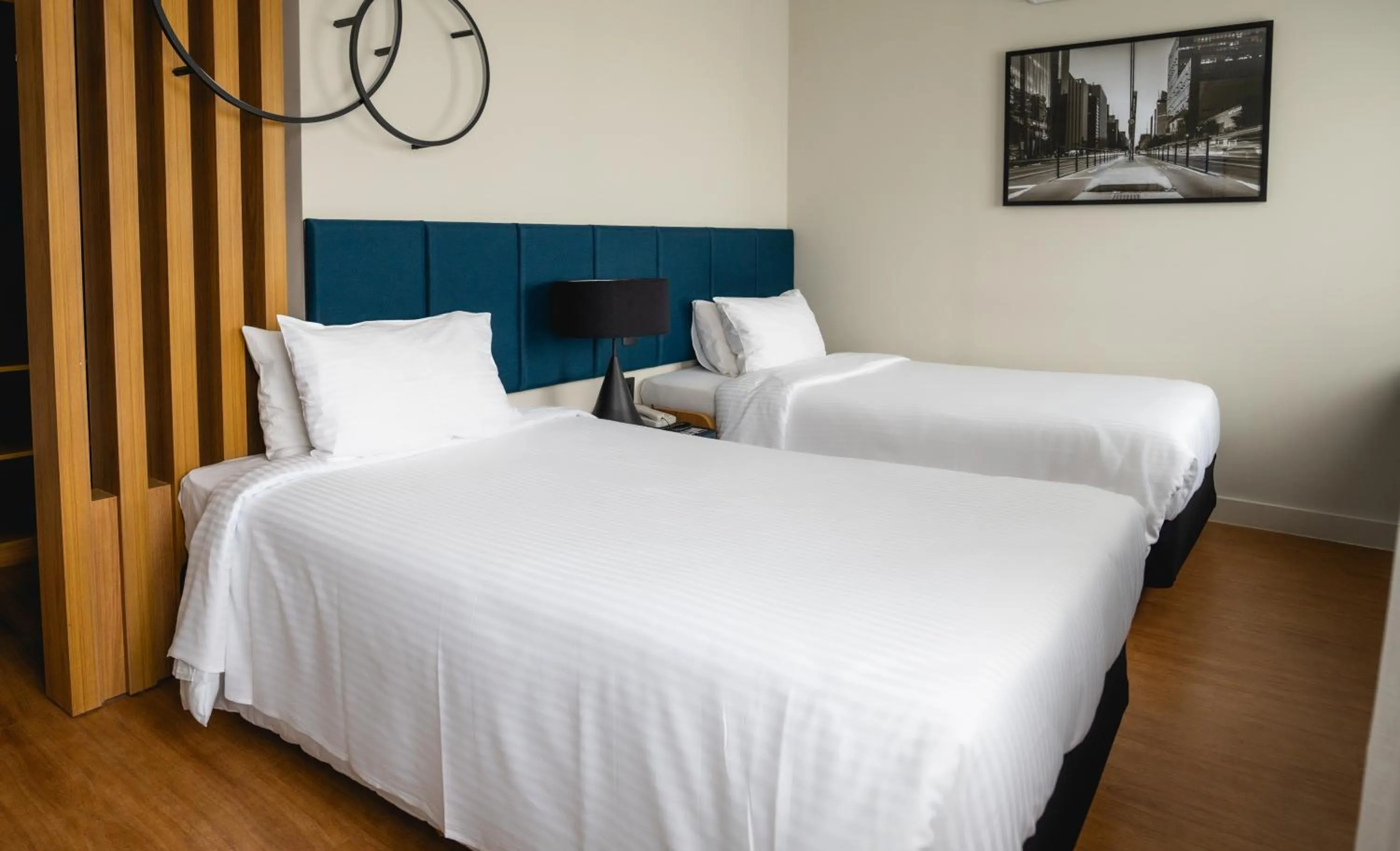 Bed in eSuítes Congonhas by Atlantica