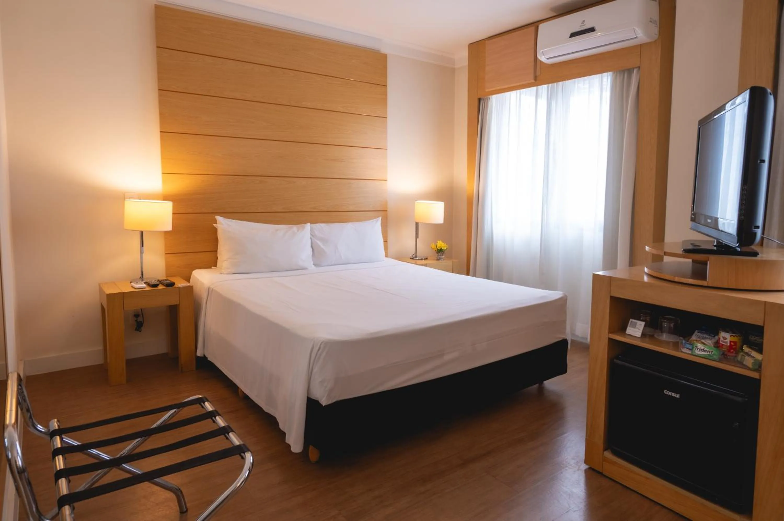 Bed in eSuítes Congonhas by Atlantica