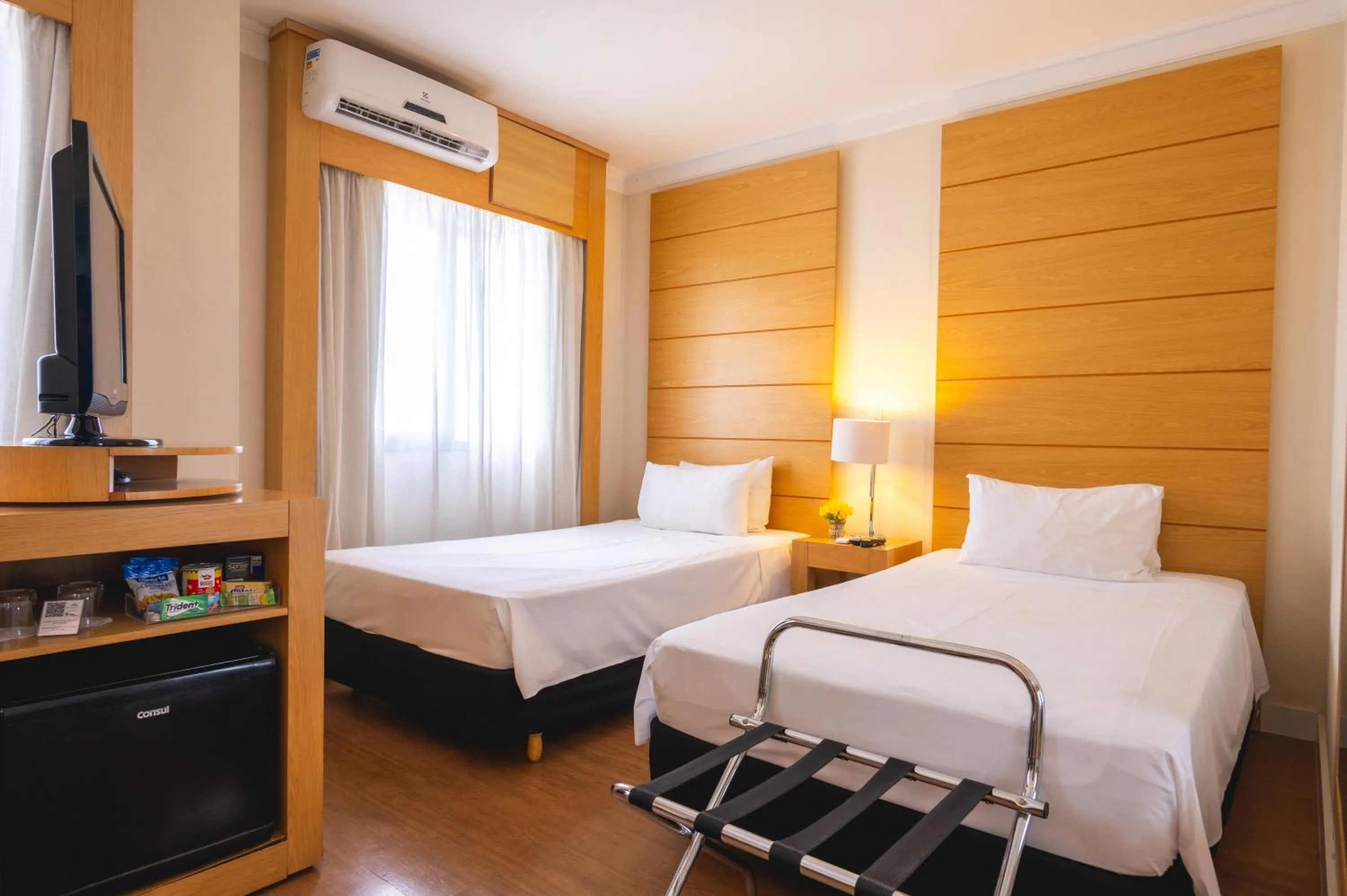 Bed in eSuítes Congonhas by Atlantica