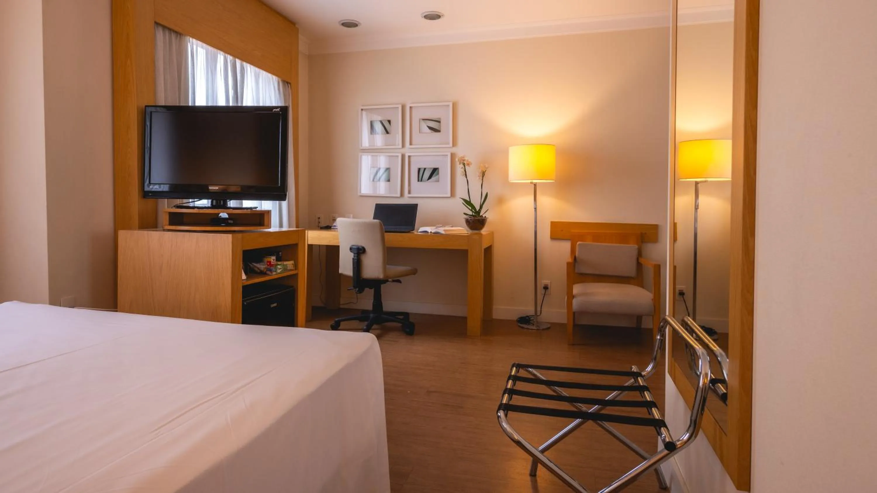 Bed in eSuítes Congonhas by Atlantica