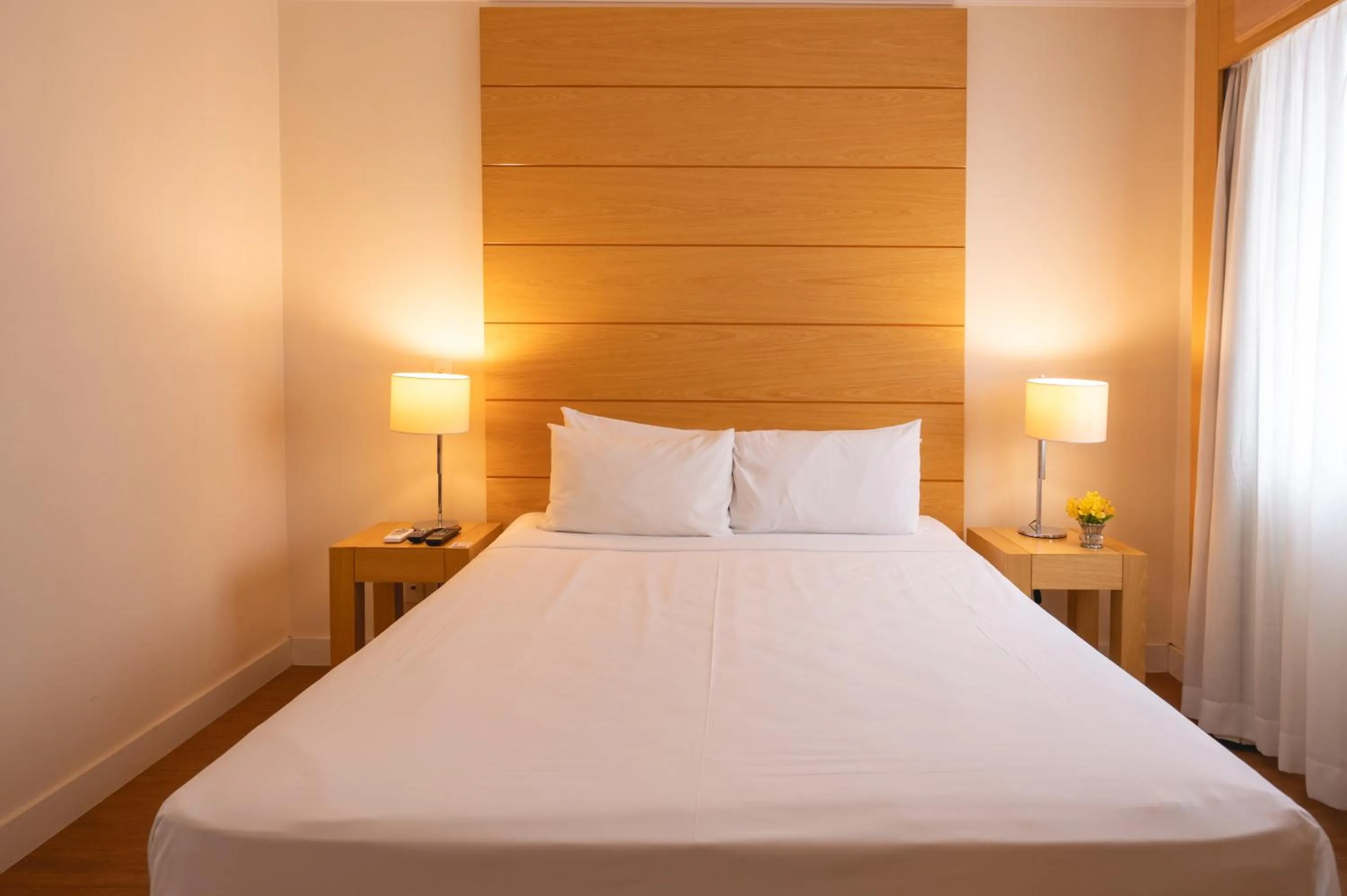 Bed in eSuítes Congonhas by Atlantica