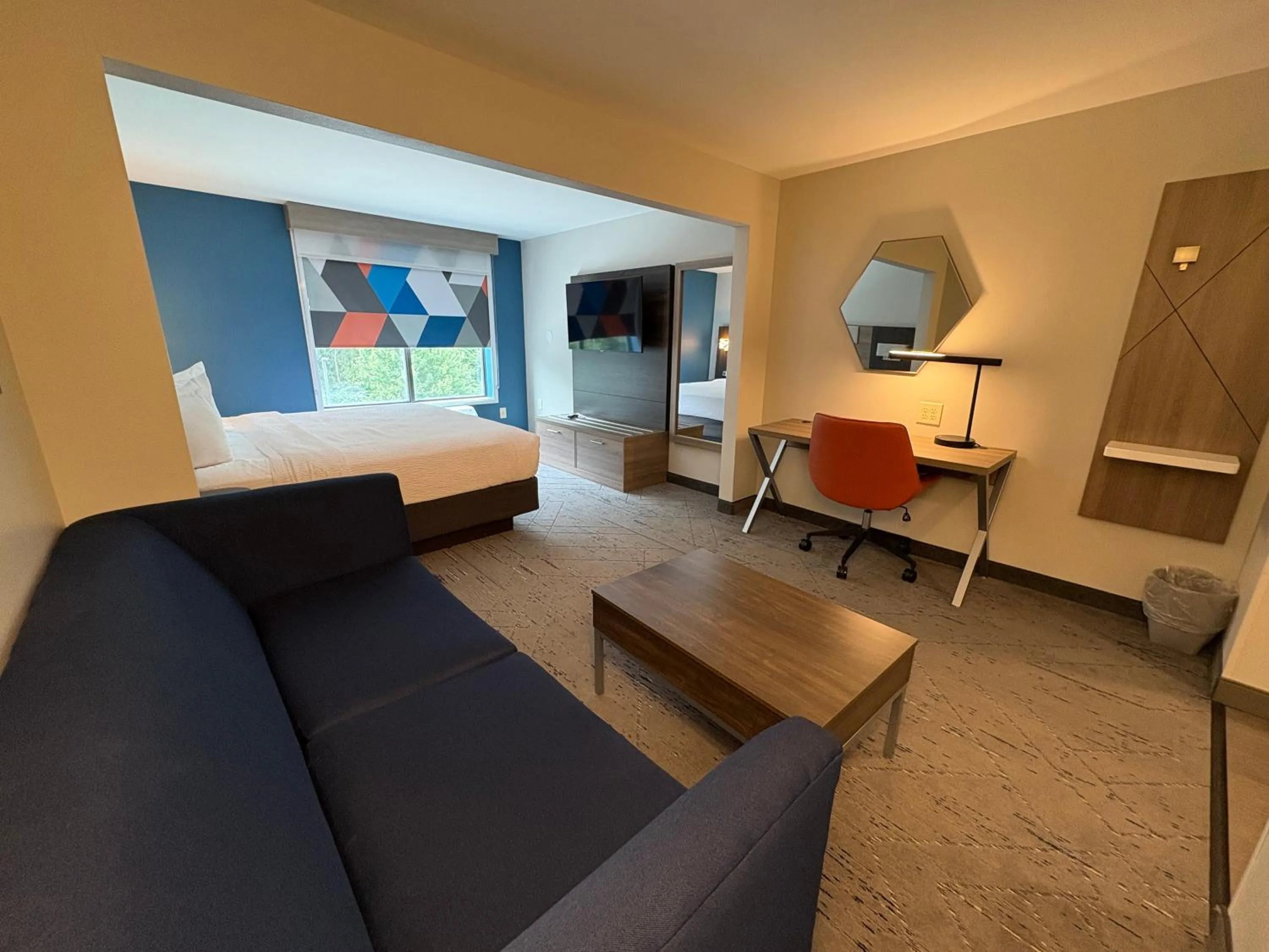 Seating area, Bed in Wingate by Wyndham State Arena Raleigh/Cary Hotel