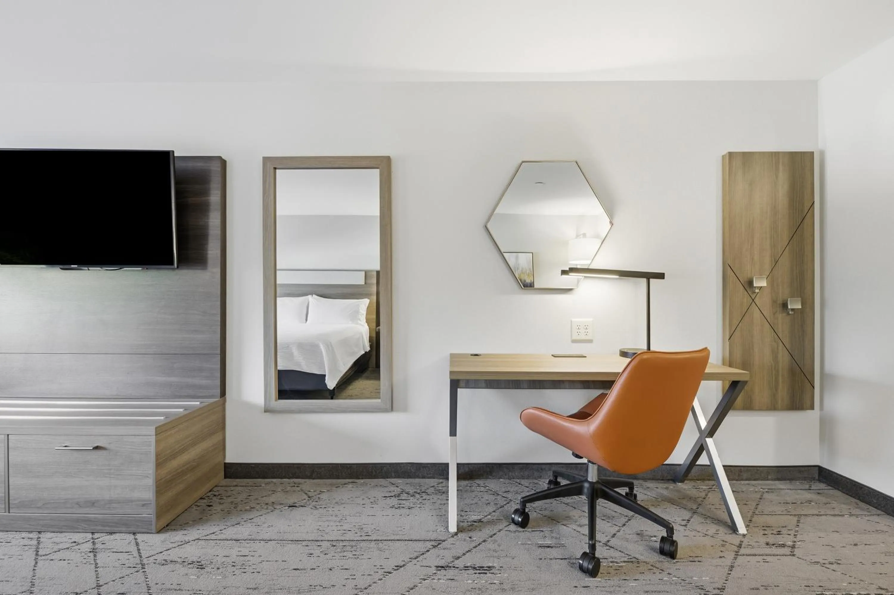 Photo of the whole room in Holiday Inn Express & Suites Raleigh West - Lenovo Center by IHG