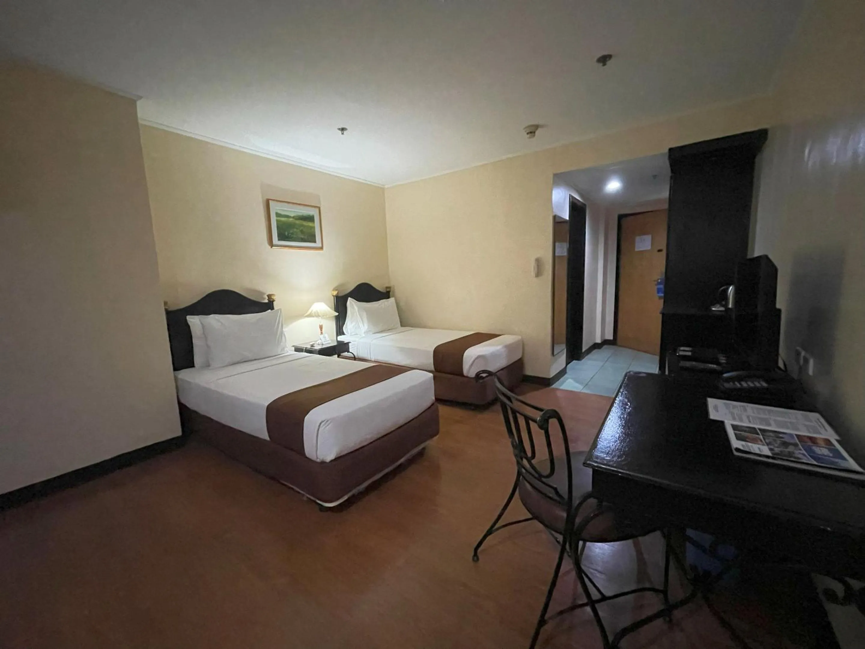 Bed in Golden Peak Hotel & Suites powered by Cocotel