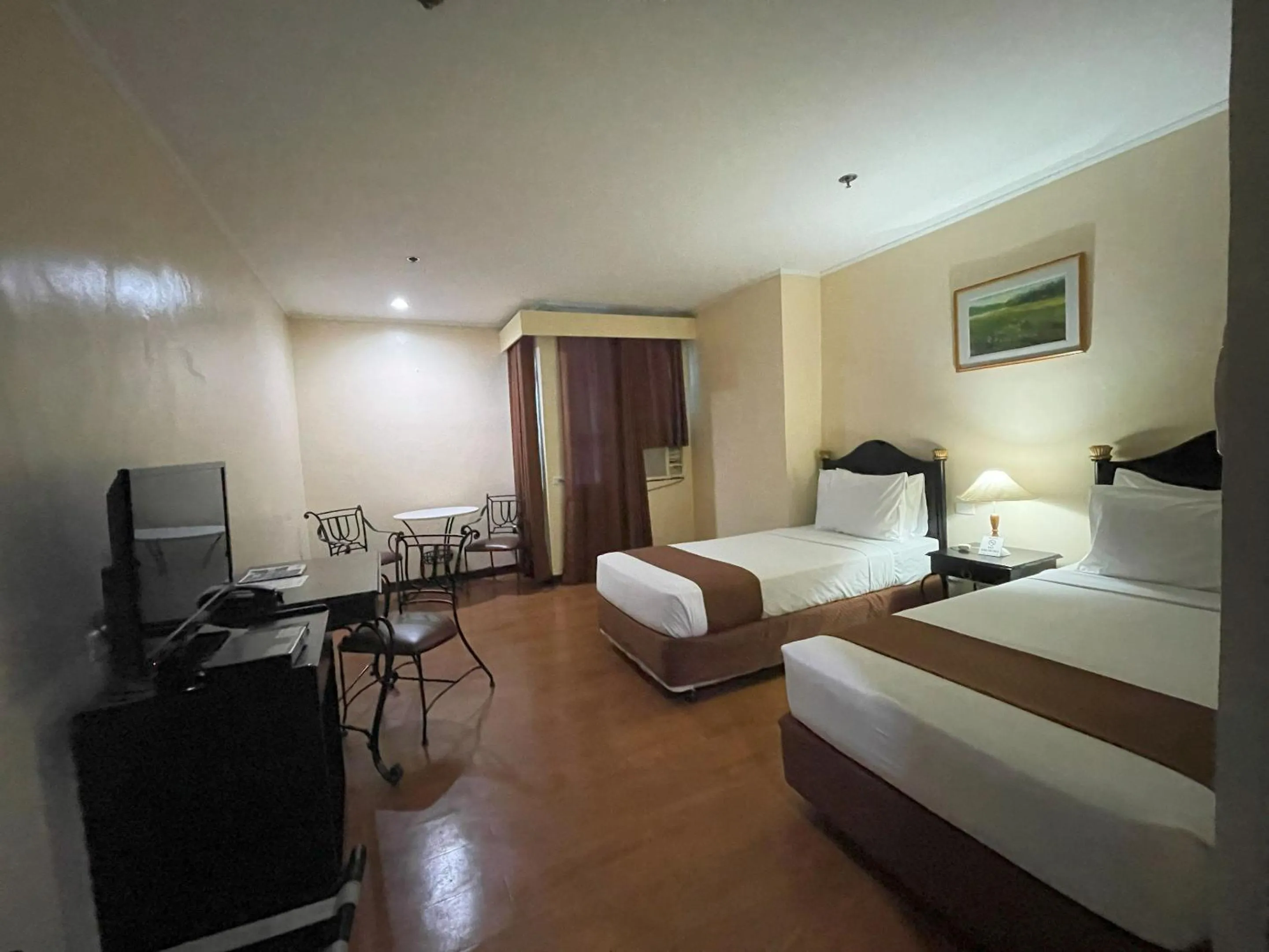 Bed in Golden Peak Hotel & Suites powered by Cocotel