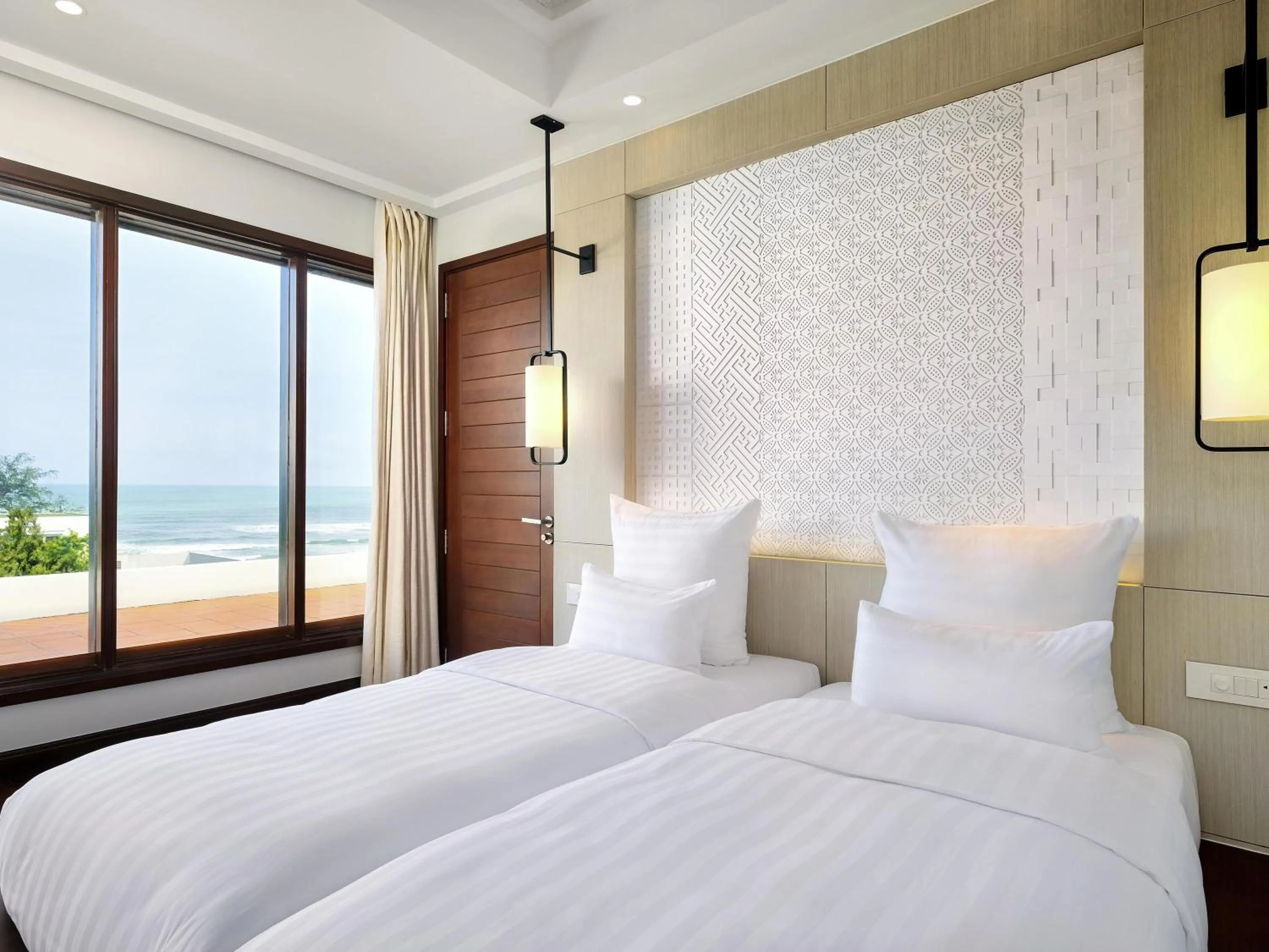 Bedroom, Bed in Pullman Danang Beach Resort