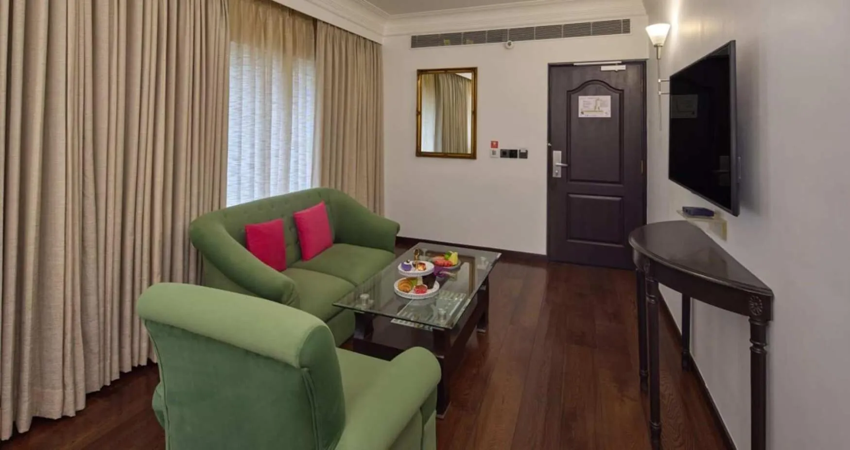 Living room in Hotel Royal Orchid Bangalore