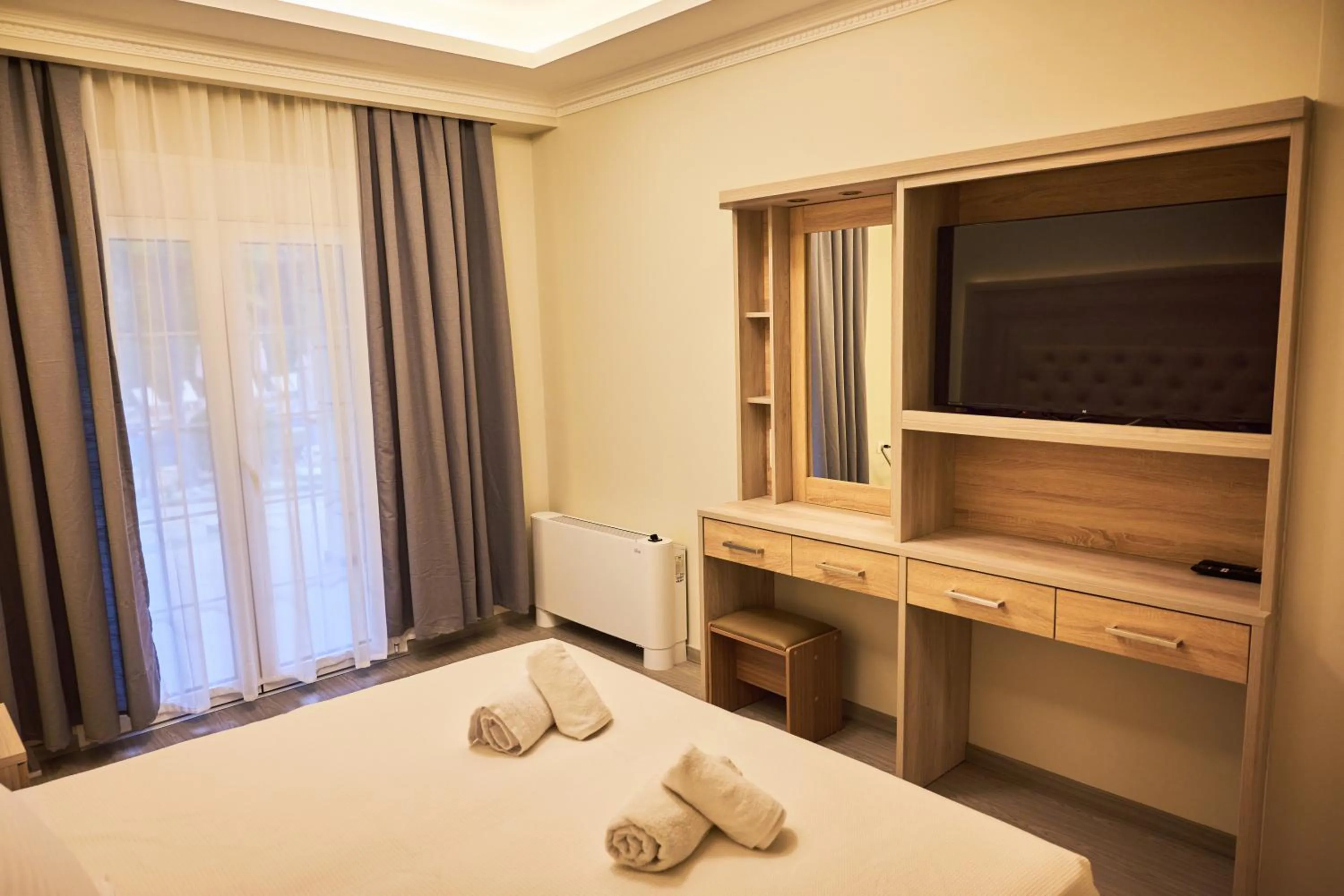 Bed in Famissi Eden Hotel