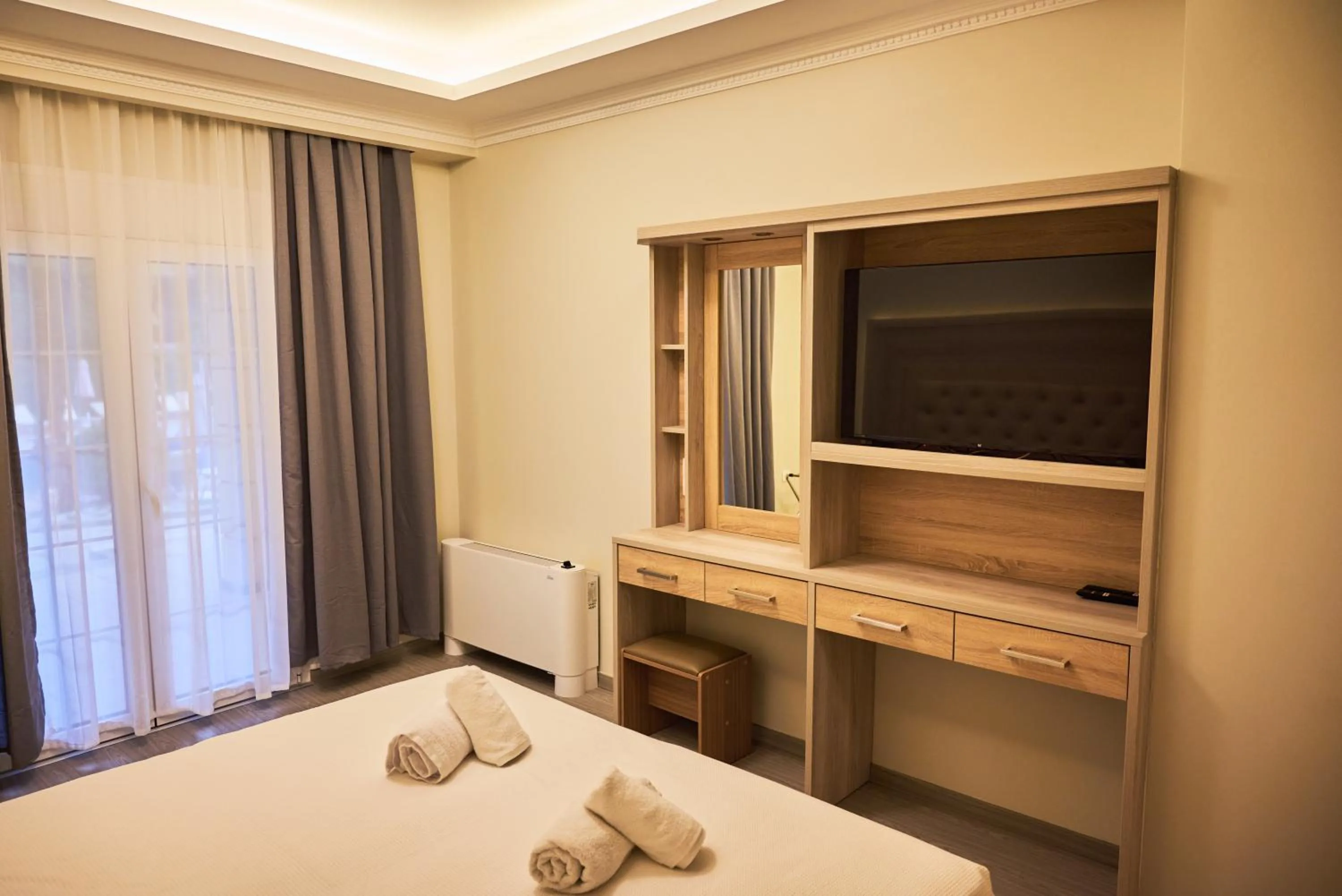 Bed in Famissi Eden Hotel