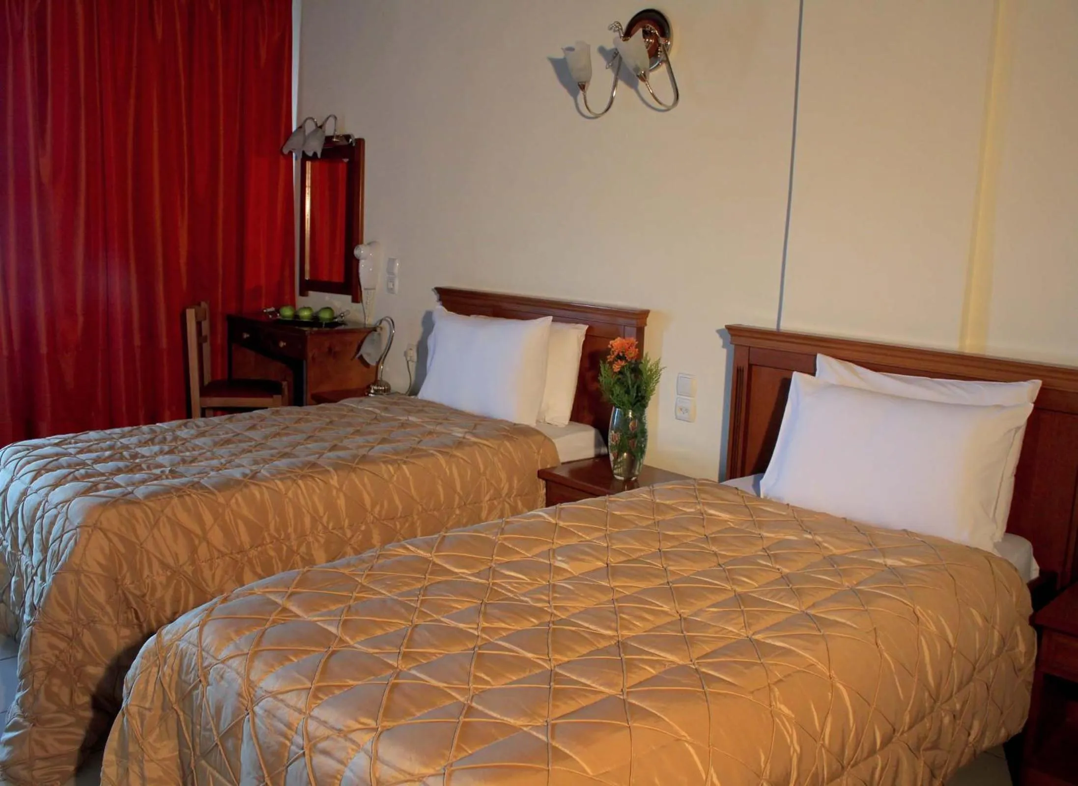 Bed in Famissi Eden Hotel