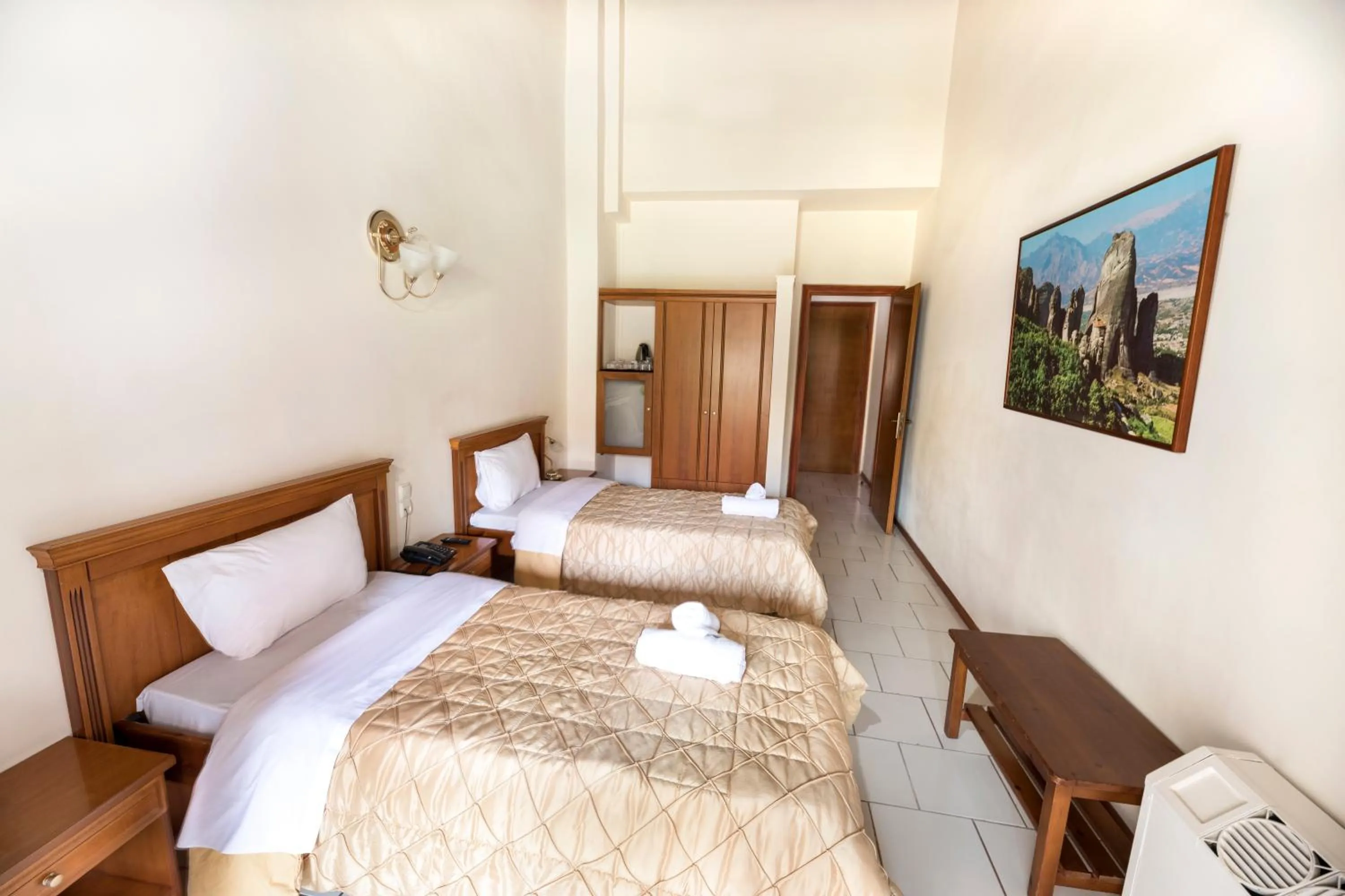 Bed in Famissi Eden Hotel