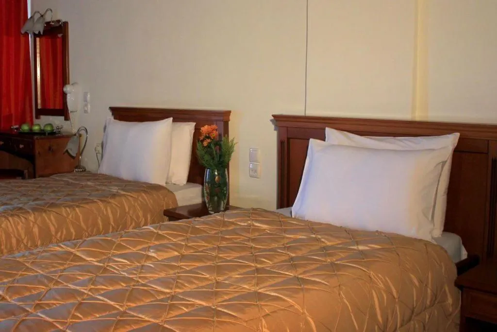 Bed in Famissi Eden Hotel