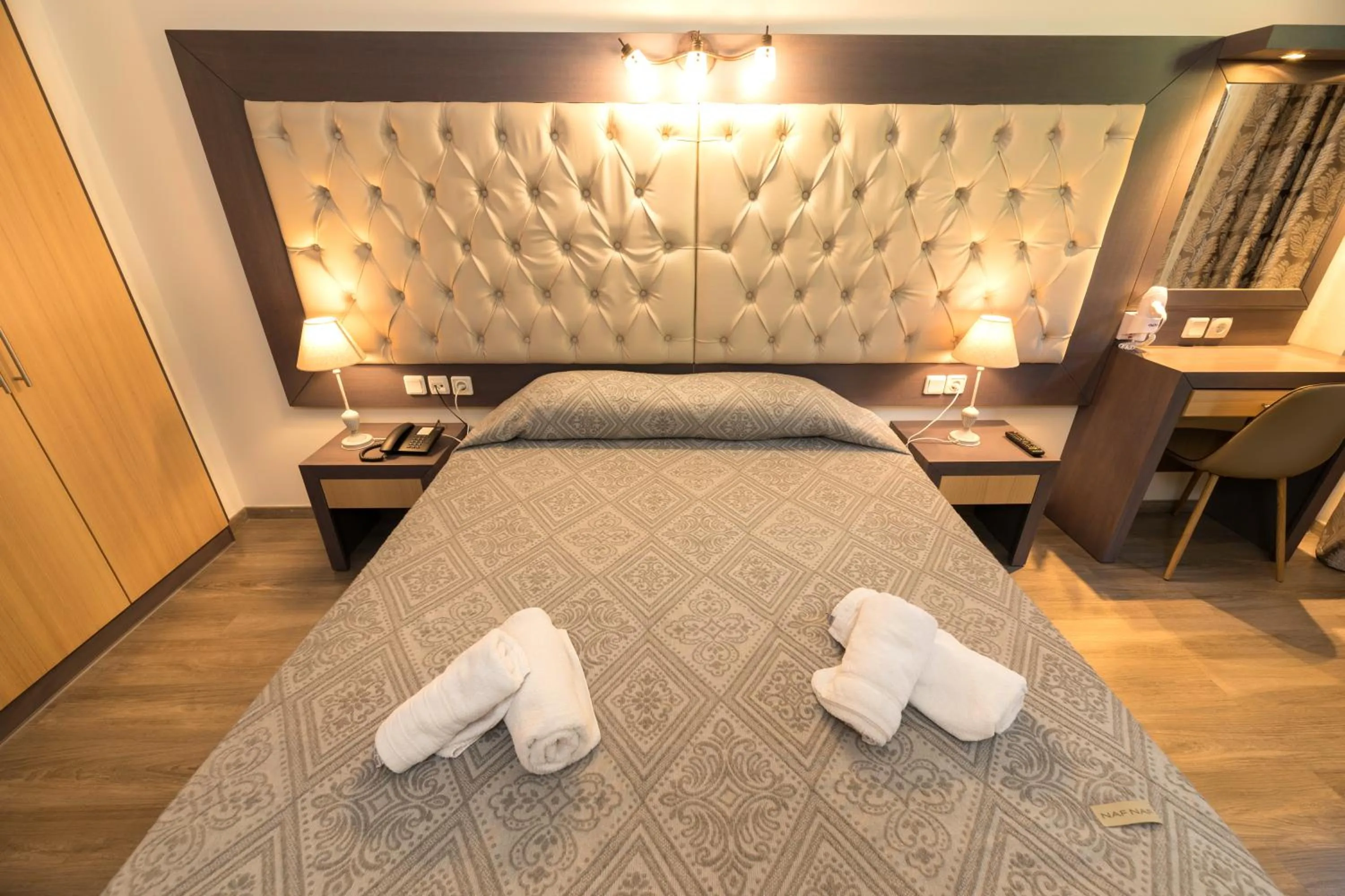 Bed in Famissi Eden Hotel