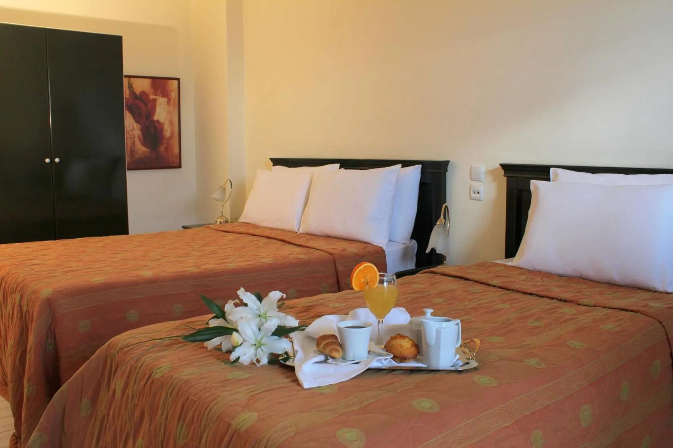 Bed in Famissi Eden Hotel