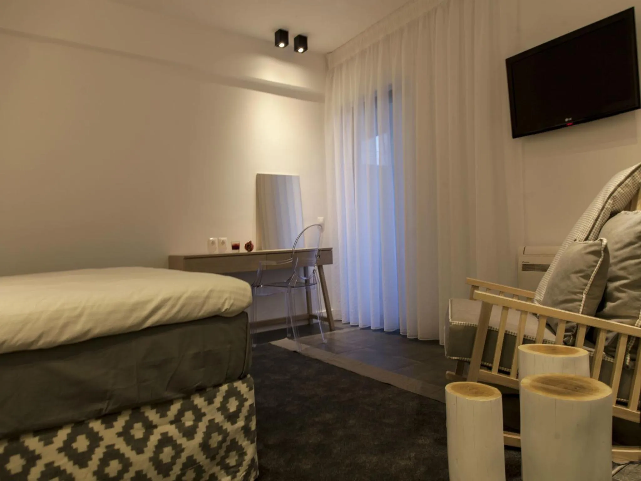 Photo of the whole room, Bed in Thomais Boutique Hotel